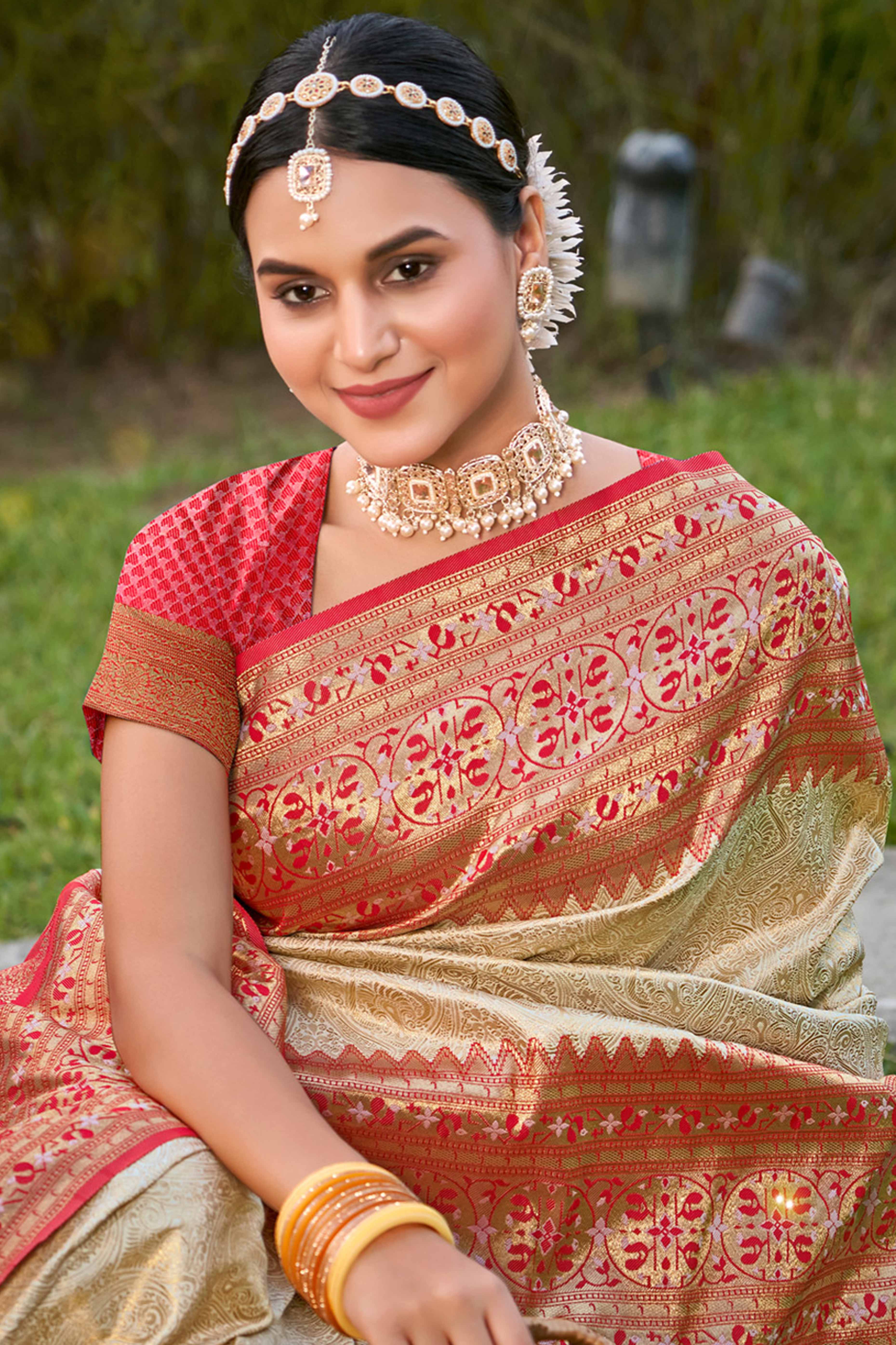 Cream Floral Zari Woven Saree In Banarasi Silk With Delicate Tassel Accents Pallu