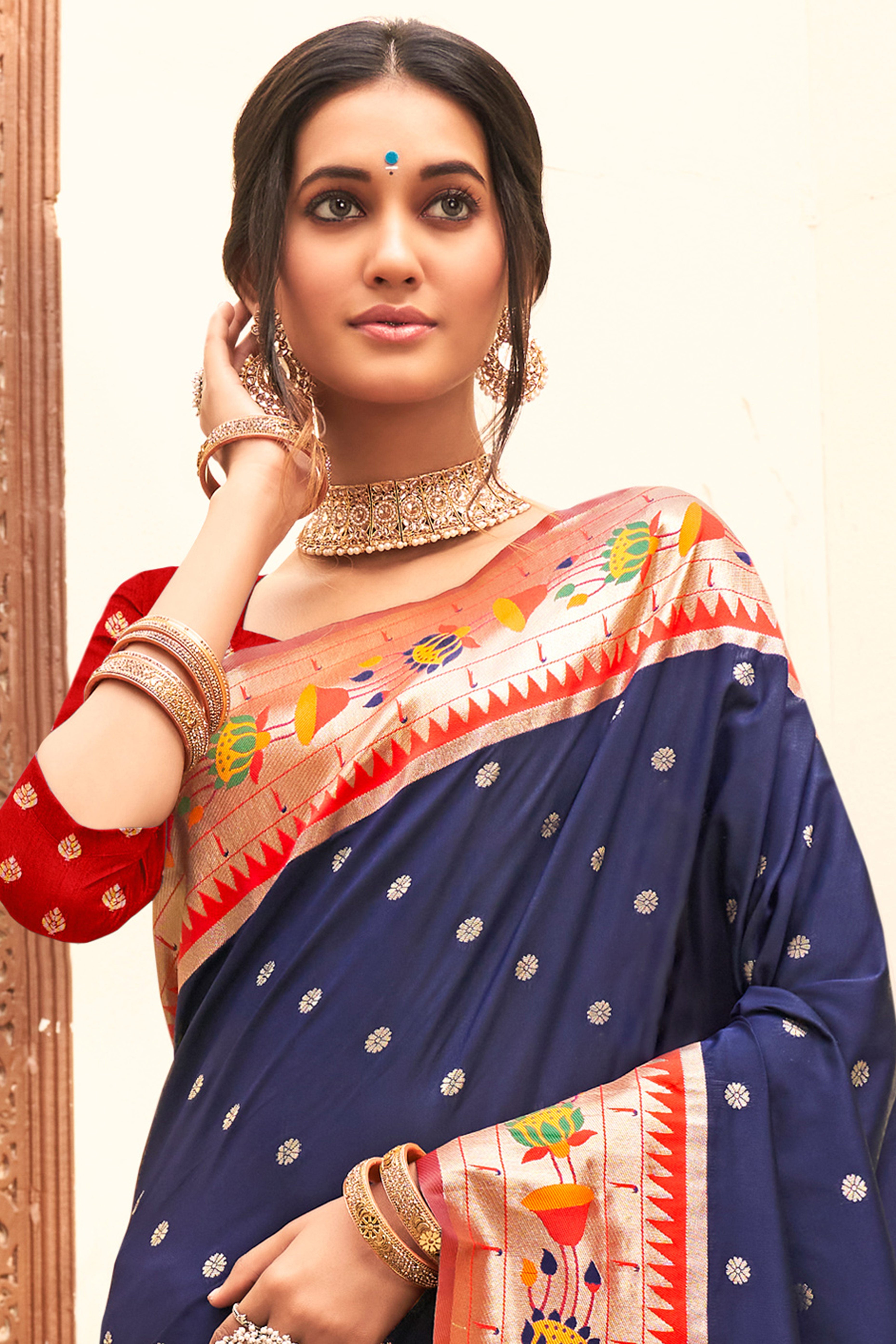 Charming Navy Blue Floral Zari Woven Silk Blend Saree With Stylish Tassel Pallu