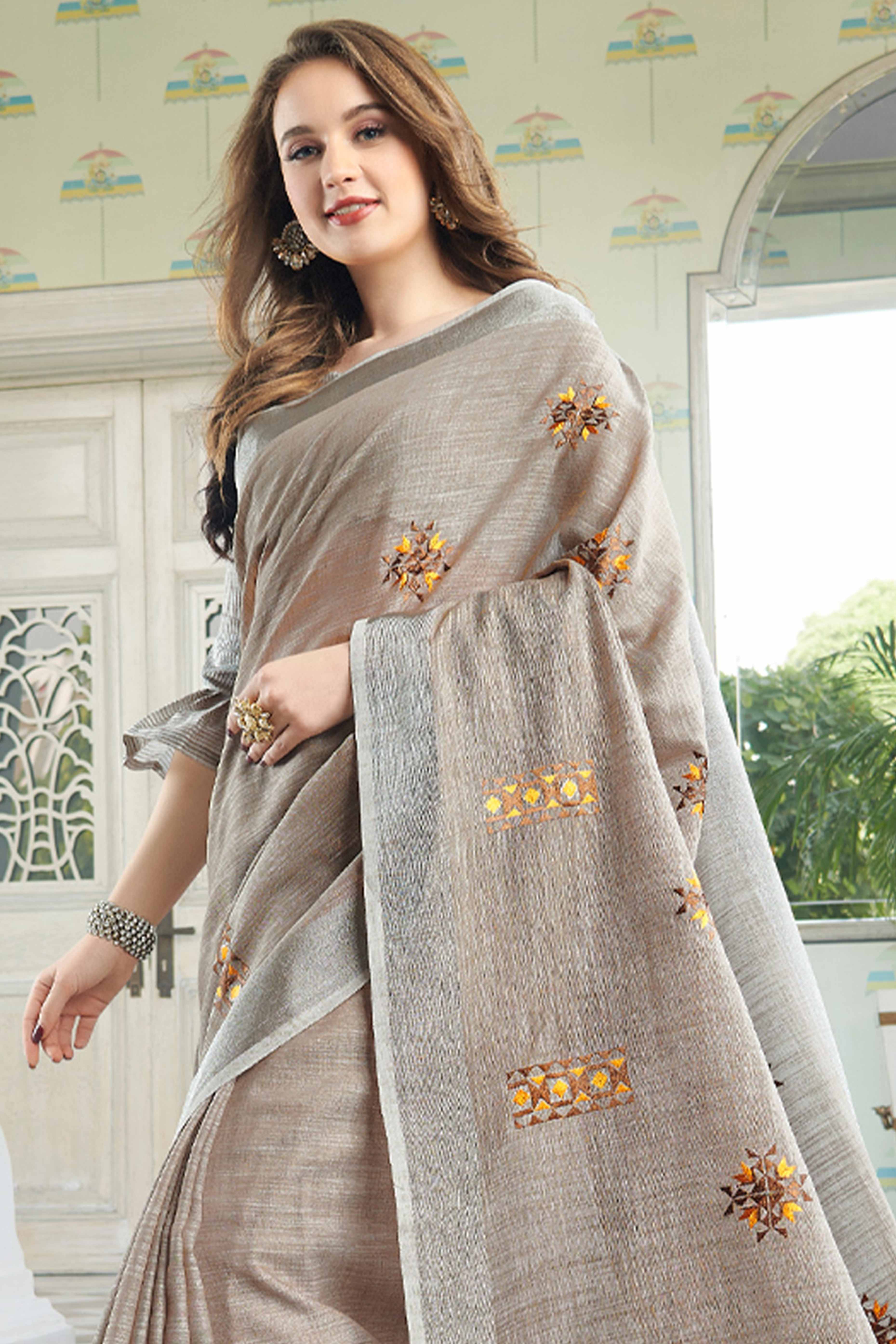 Light Beige Linen Saree with Intricate Floral Embroidery and Classic Weaving