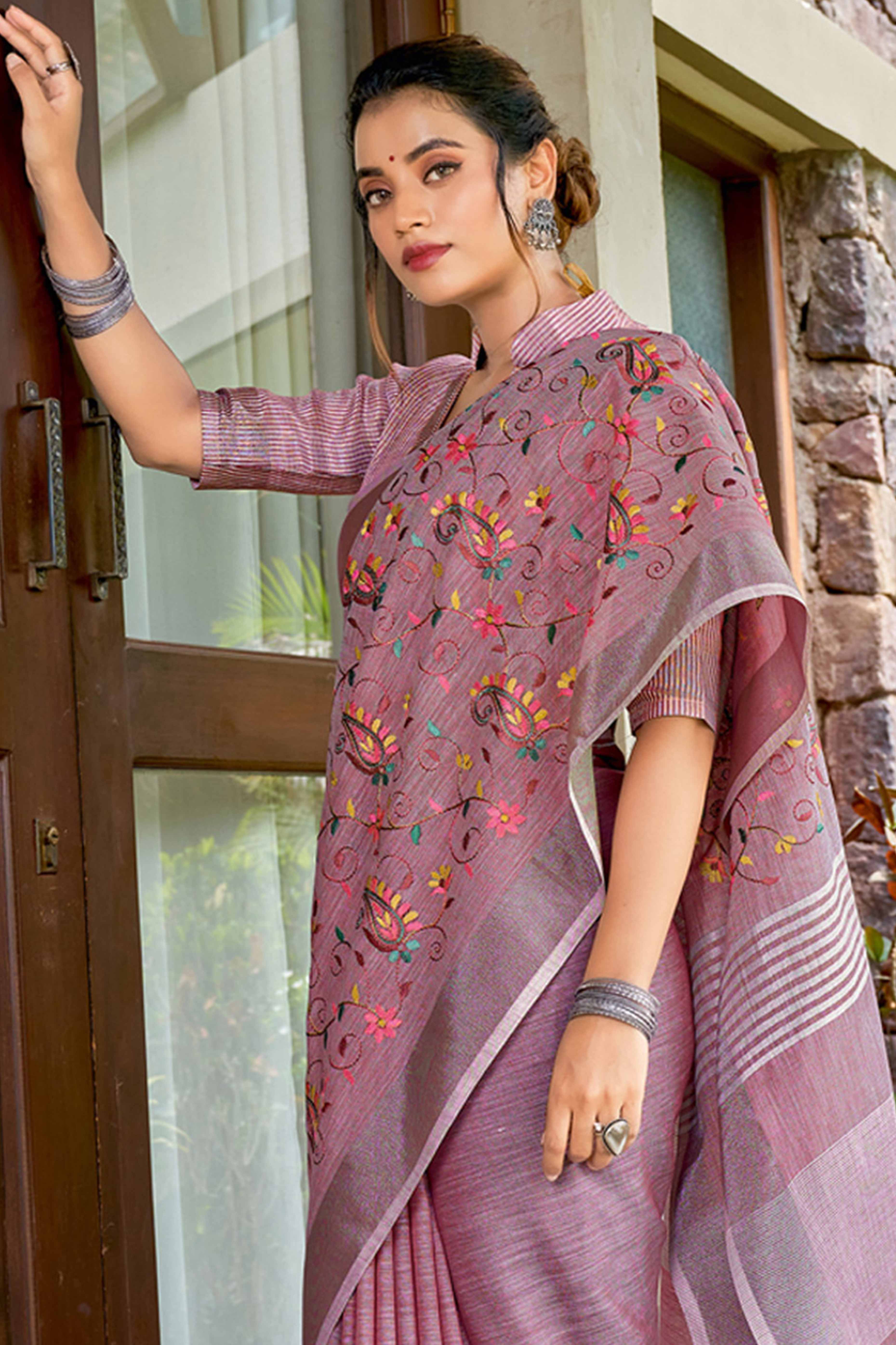 Handwoven Mauve Linen Saree with Floral Embroidered Patterns