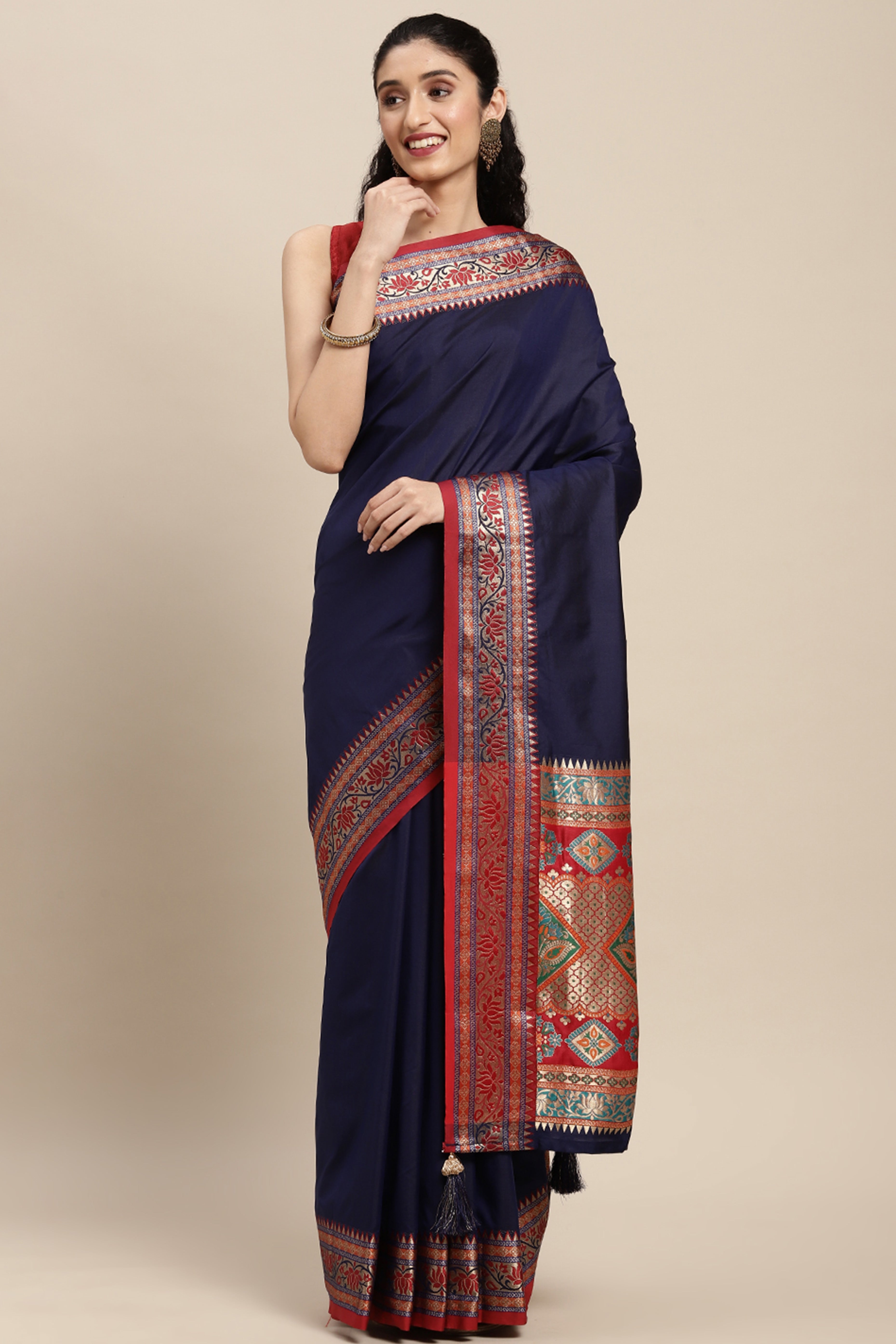 Graceful Navy Blue Solid Saree Highlighted With Floral Zari Weaving On Silk Blend & Tassel Pallu