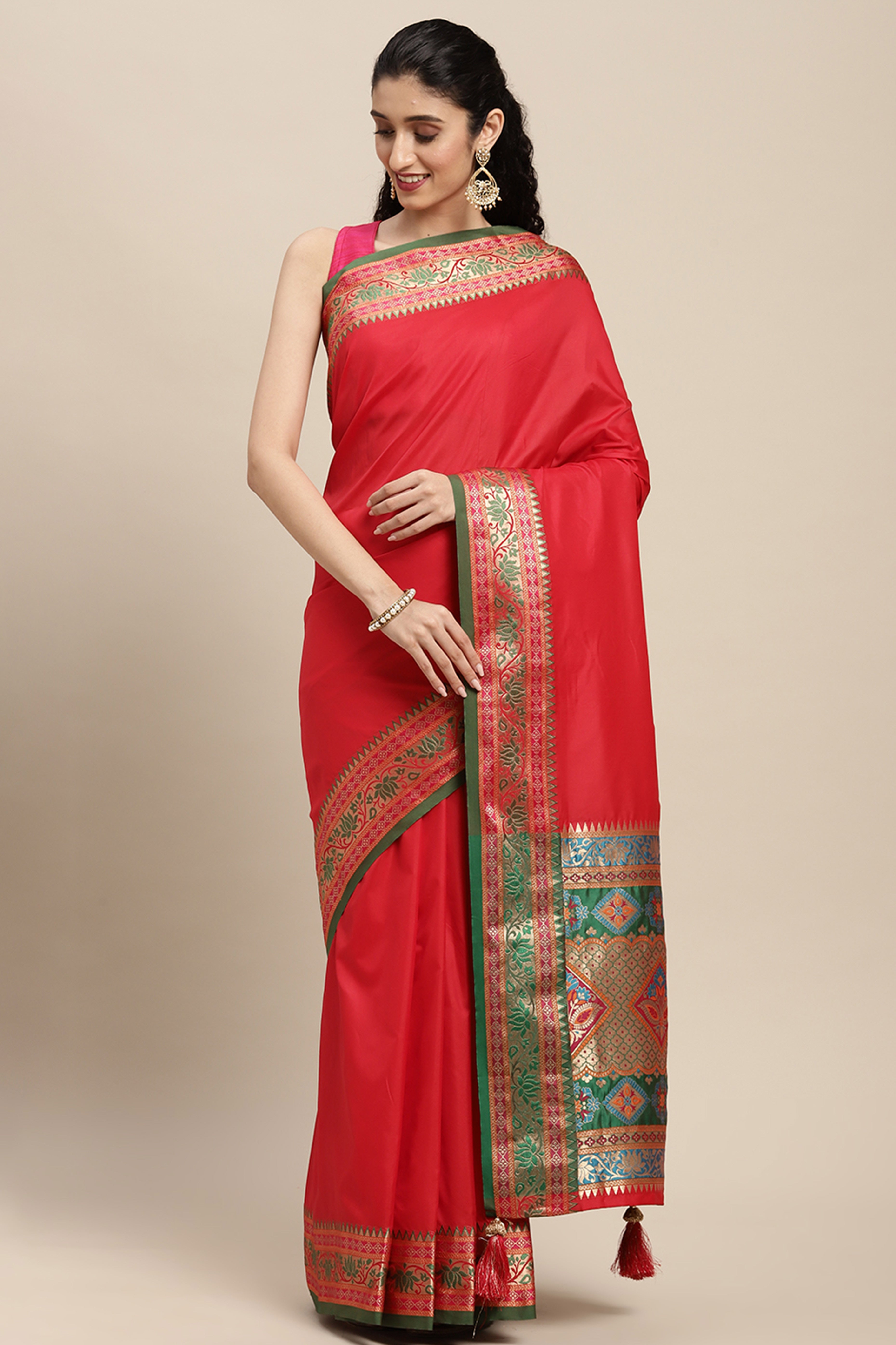 Graceful Red Solid Saree Highlighted With Floral Zari Weaving On Silk Blend & Tassel Pallu