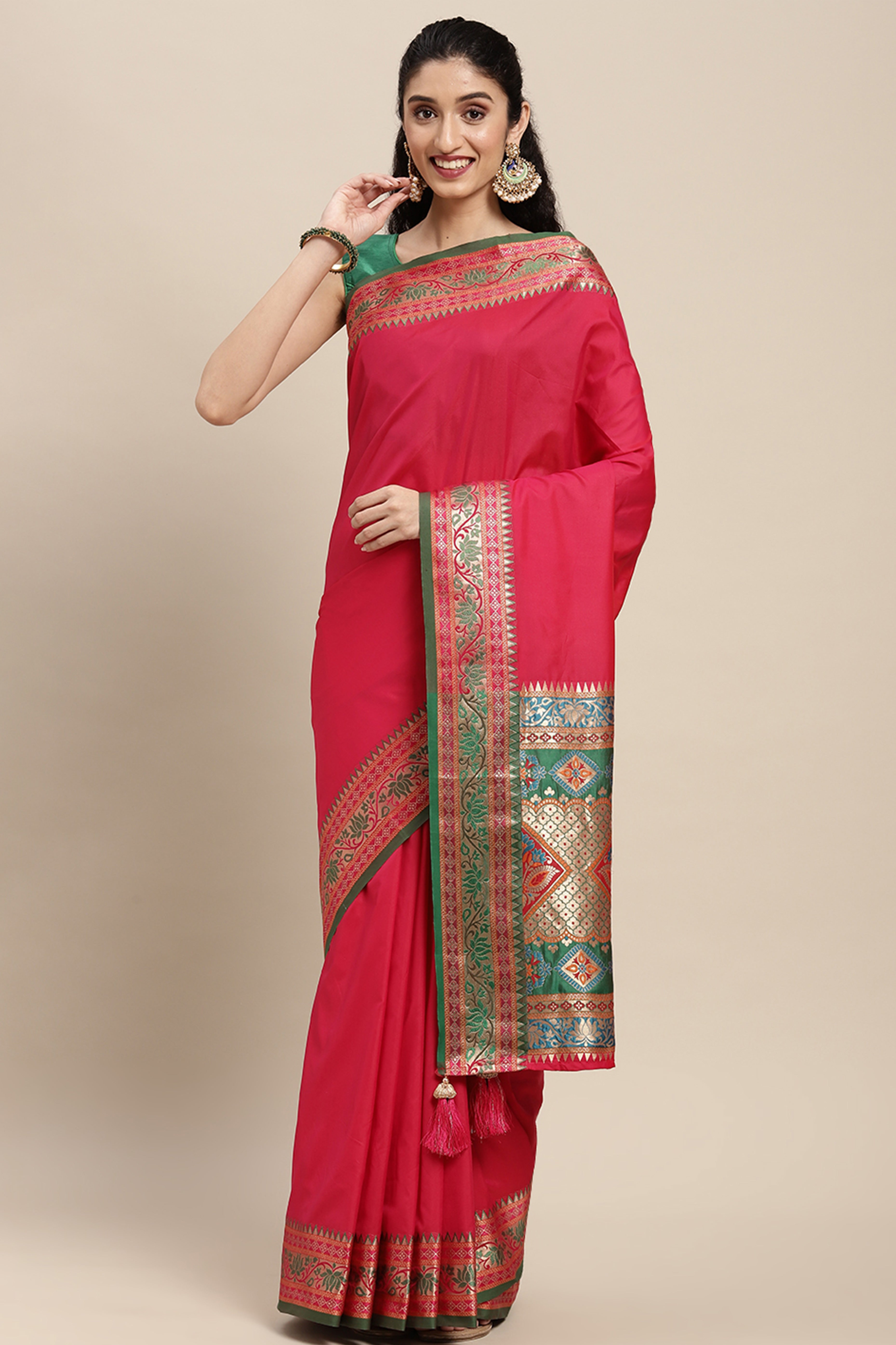 Graceful Pink Solid Saree Highlighted With Floral Zari Weaving On Silk Blend & Tassel Pallu