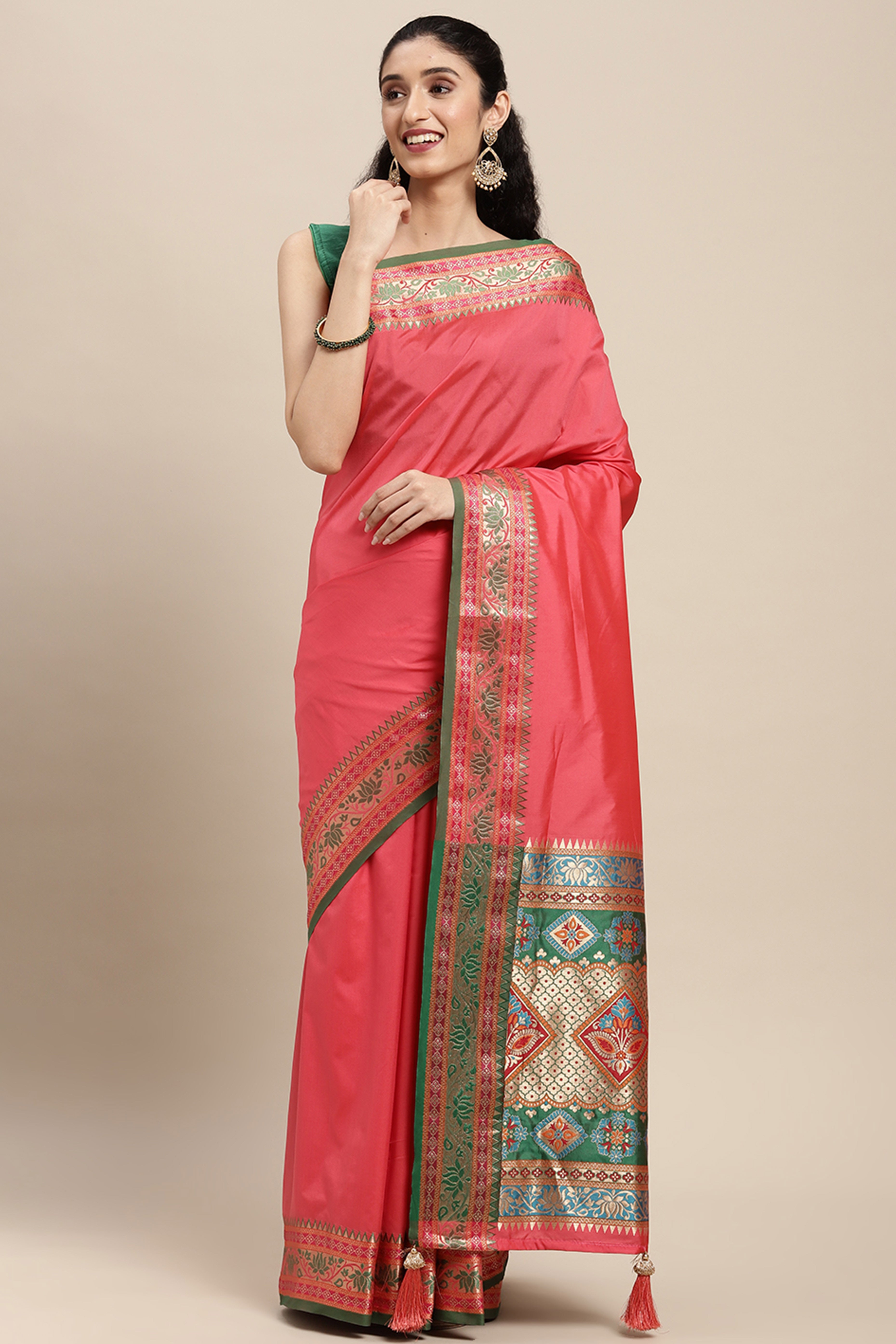 Graceful Gajari Pink Solid Saree Highlighted With Floral Zari Weaving On Silk Blend & Tassel Pallu