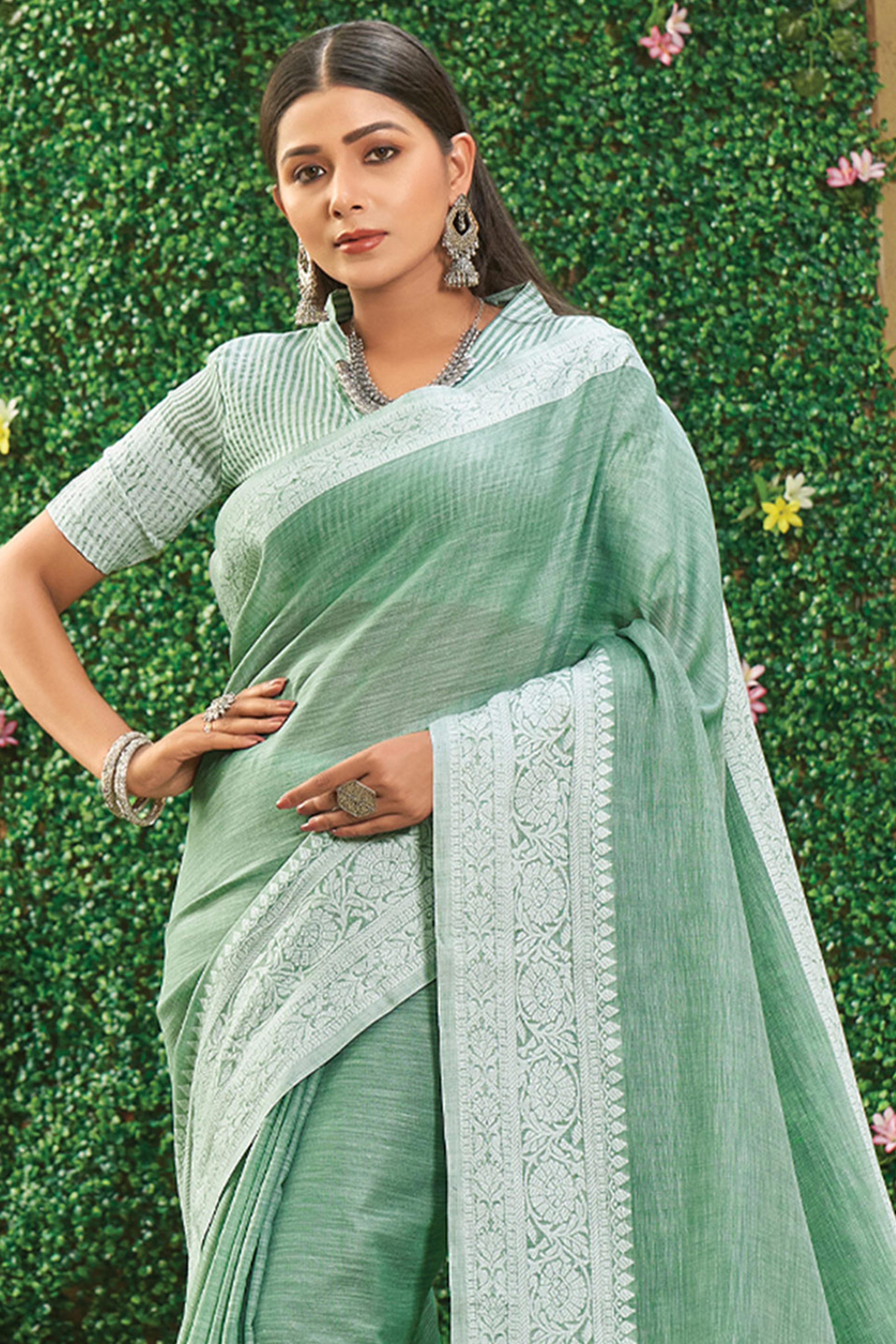 Rama Green Lightweight Linen Saree with Decorative Zari Border Weaving
