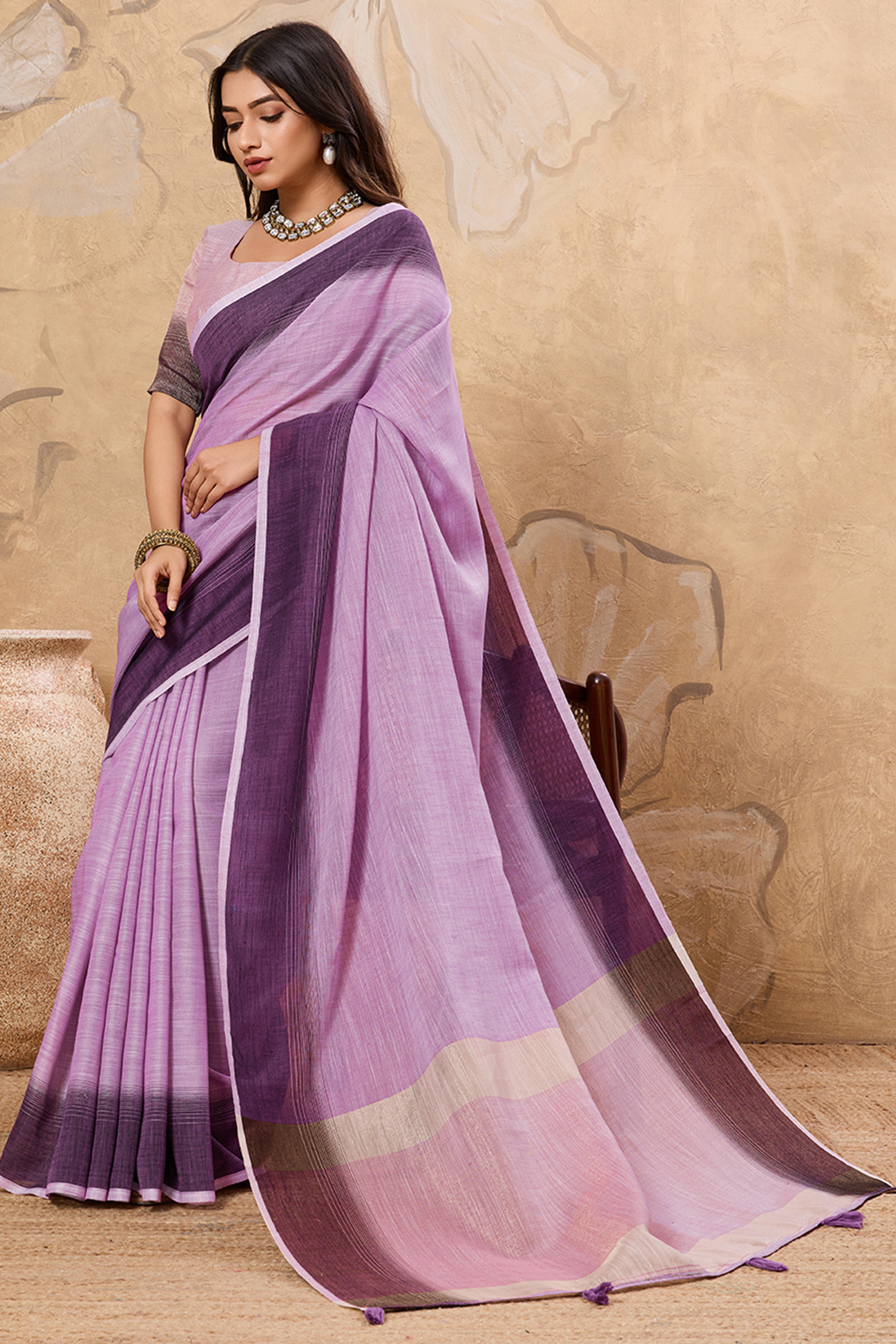 Stylish Purple Linen Saree With Zari Weaving Work & Tassel Pallu Charm
