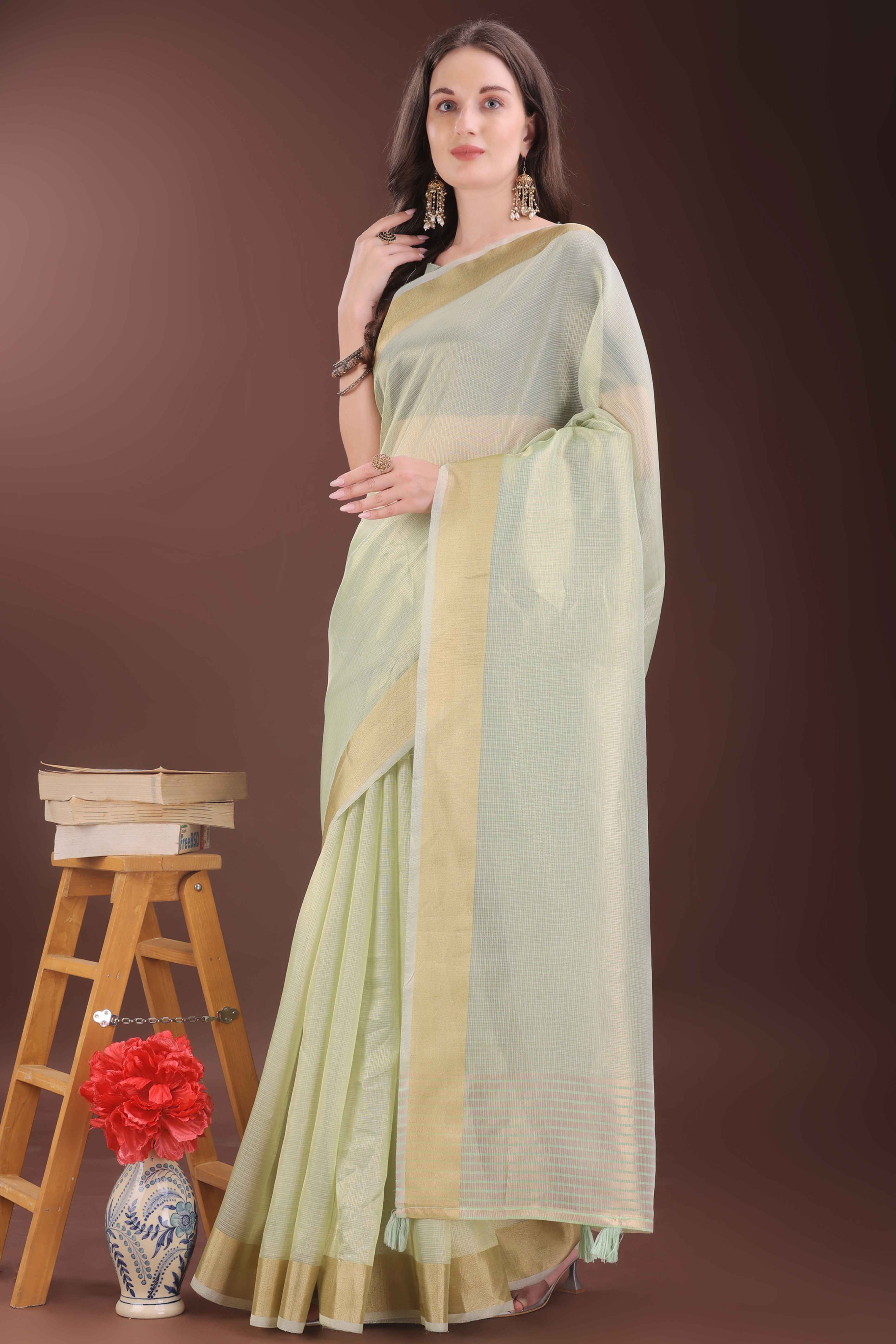 Light Green Zari Woven Organza Saree With Graceful Tassel Border