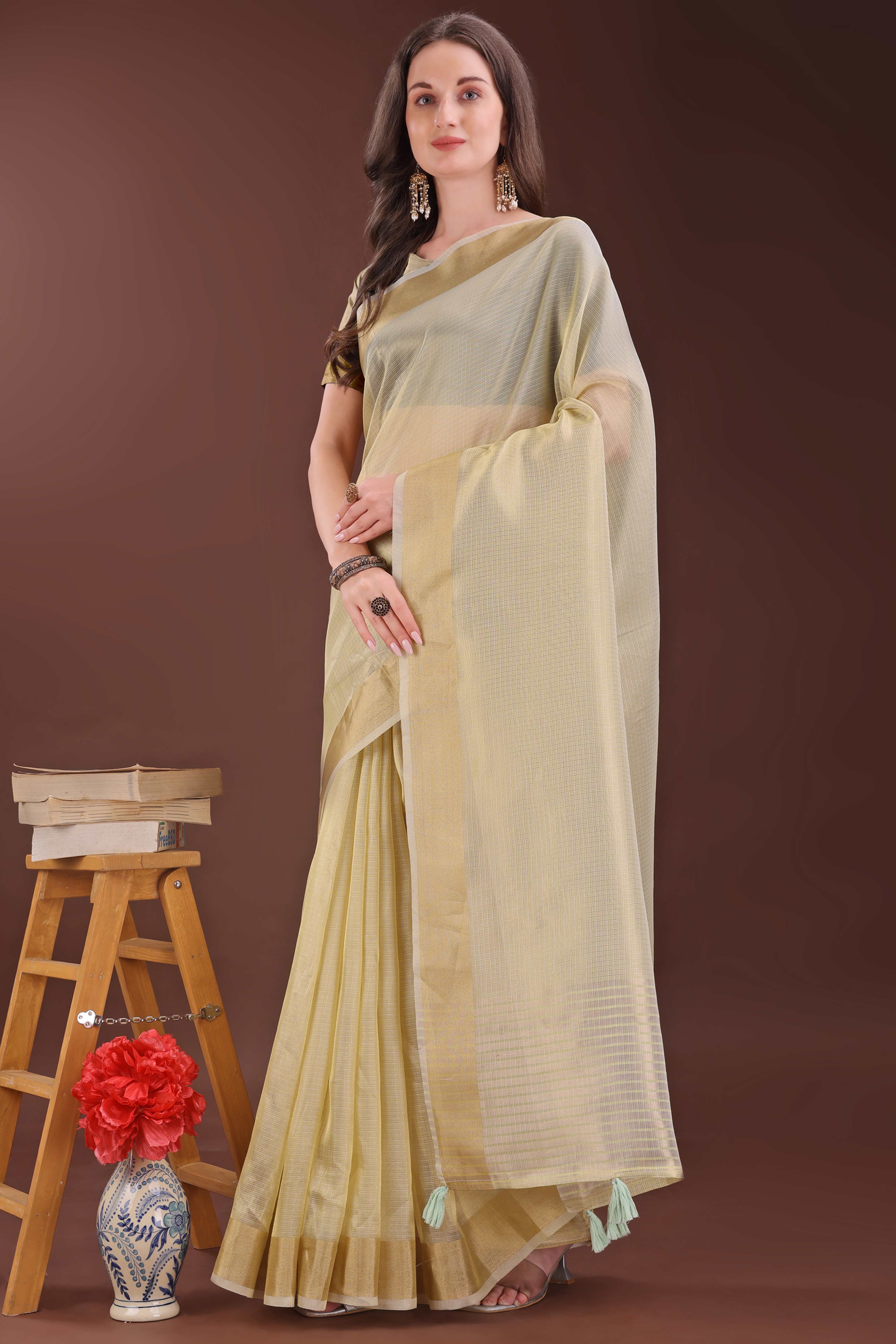 Light Yellow Zari Woven Organza Saree With Graceful Tassel Border