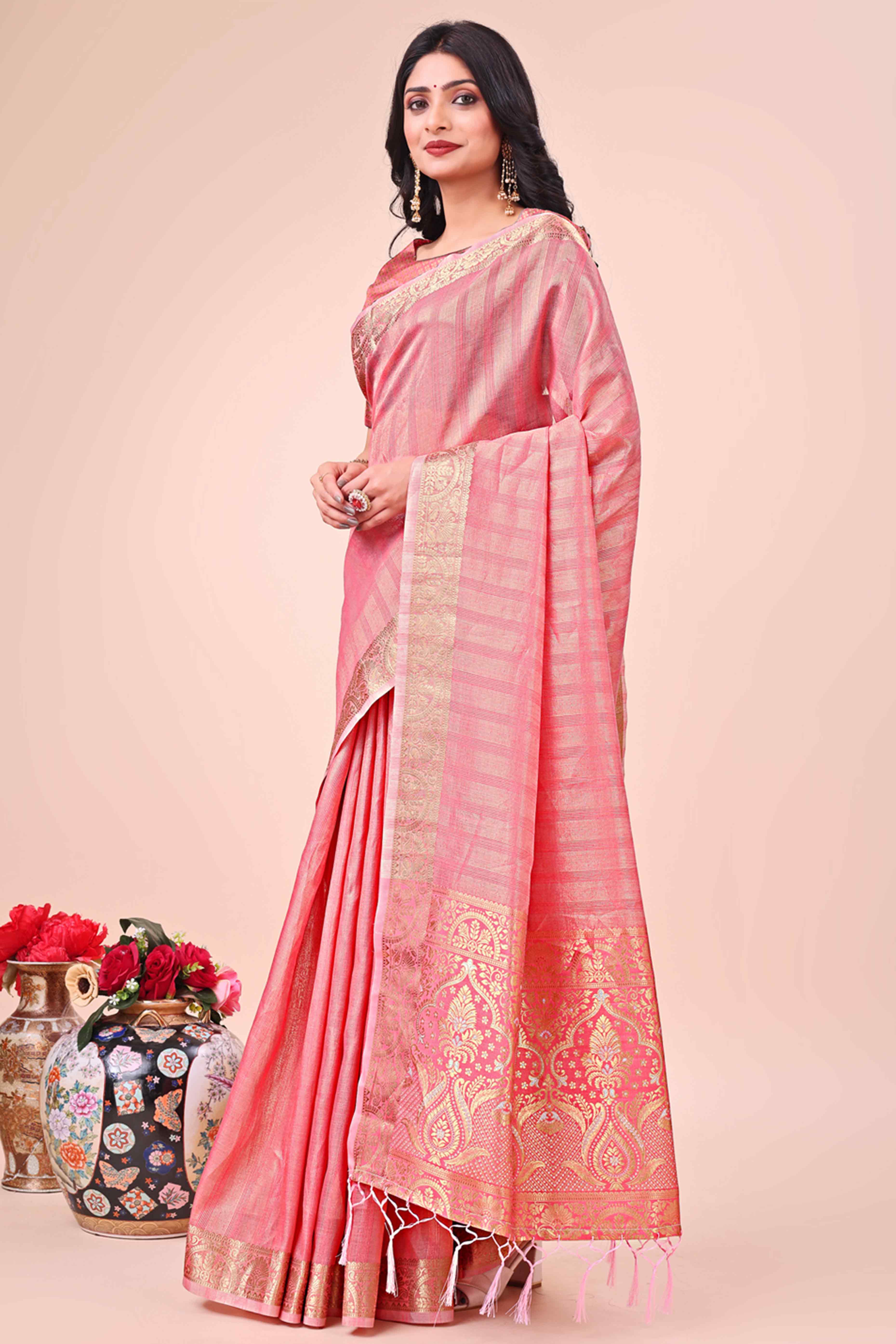 Peach Organza Saree With Floral Zari Weave & Tassel Accents