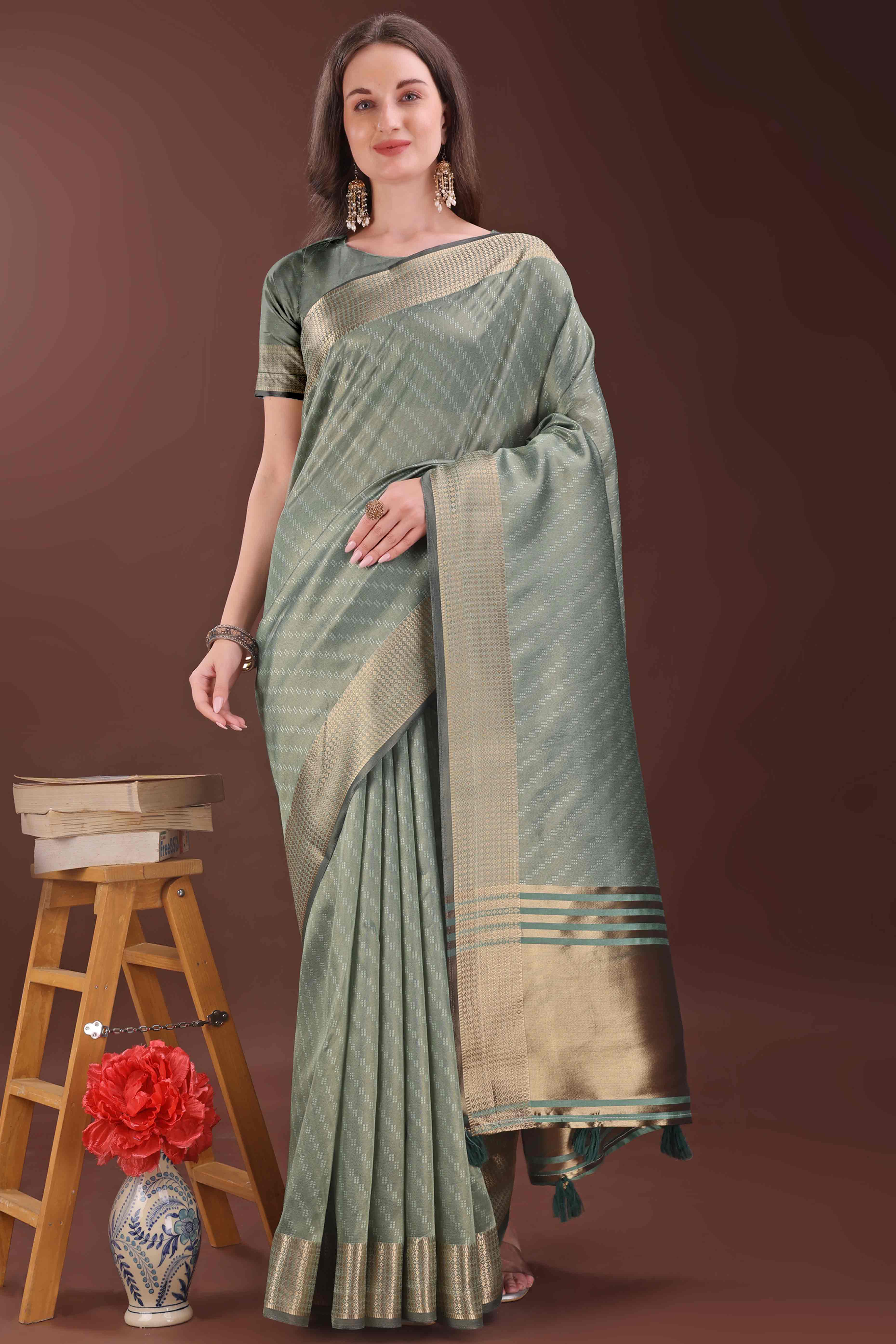 Green Zari Weaving Organza Saree With Tassel Border