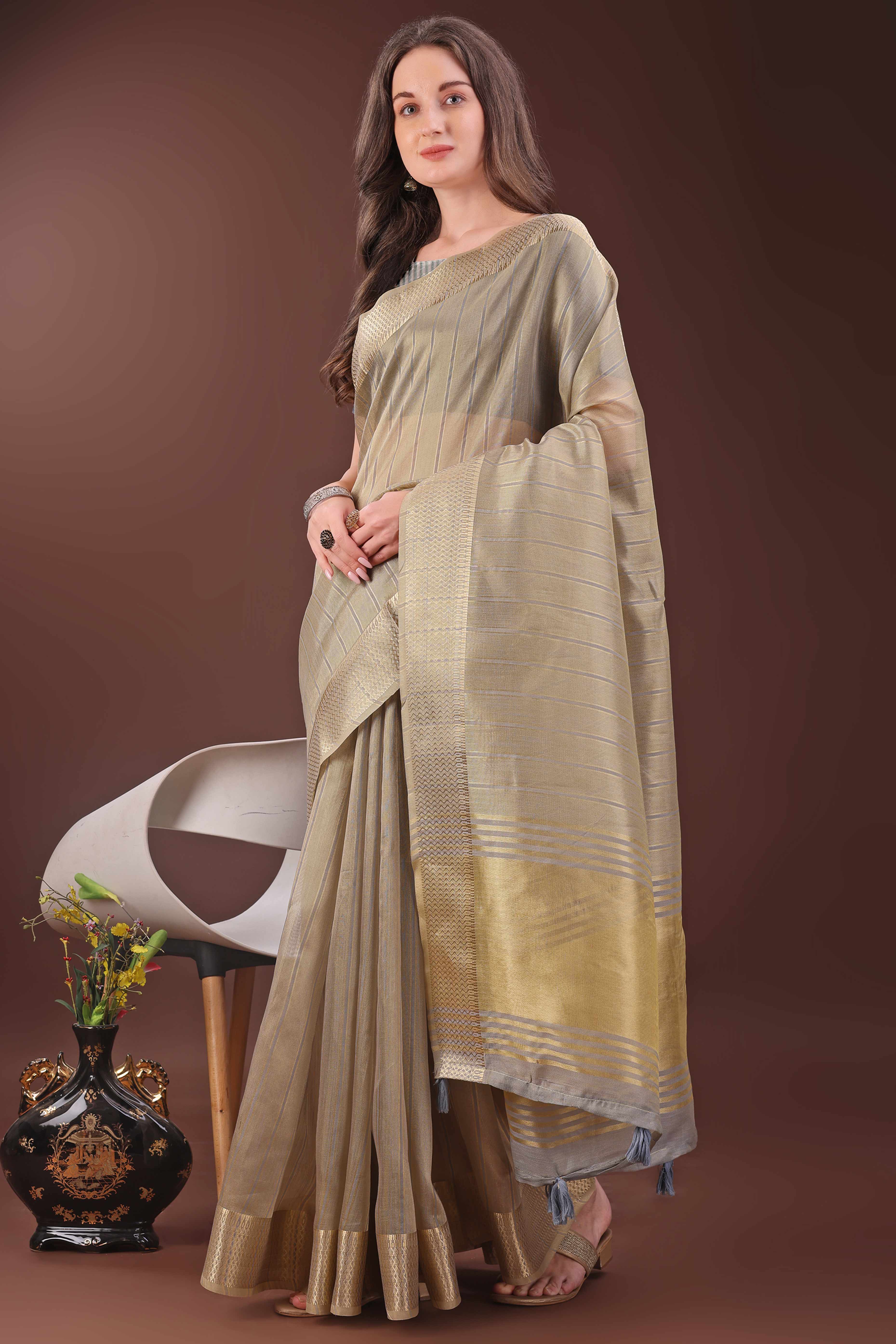 Beige Organza Saree With Zari Woven Stripes & Elegant Tassel Border