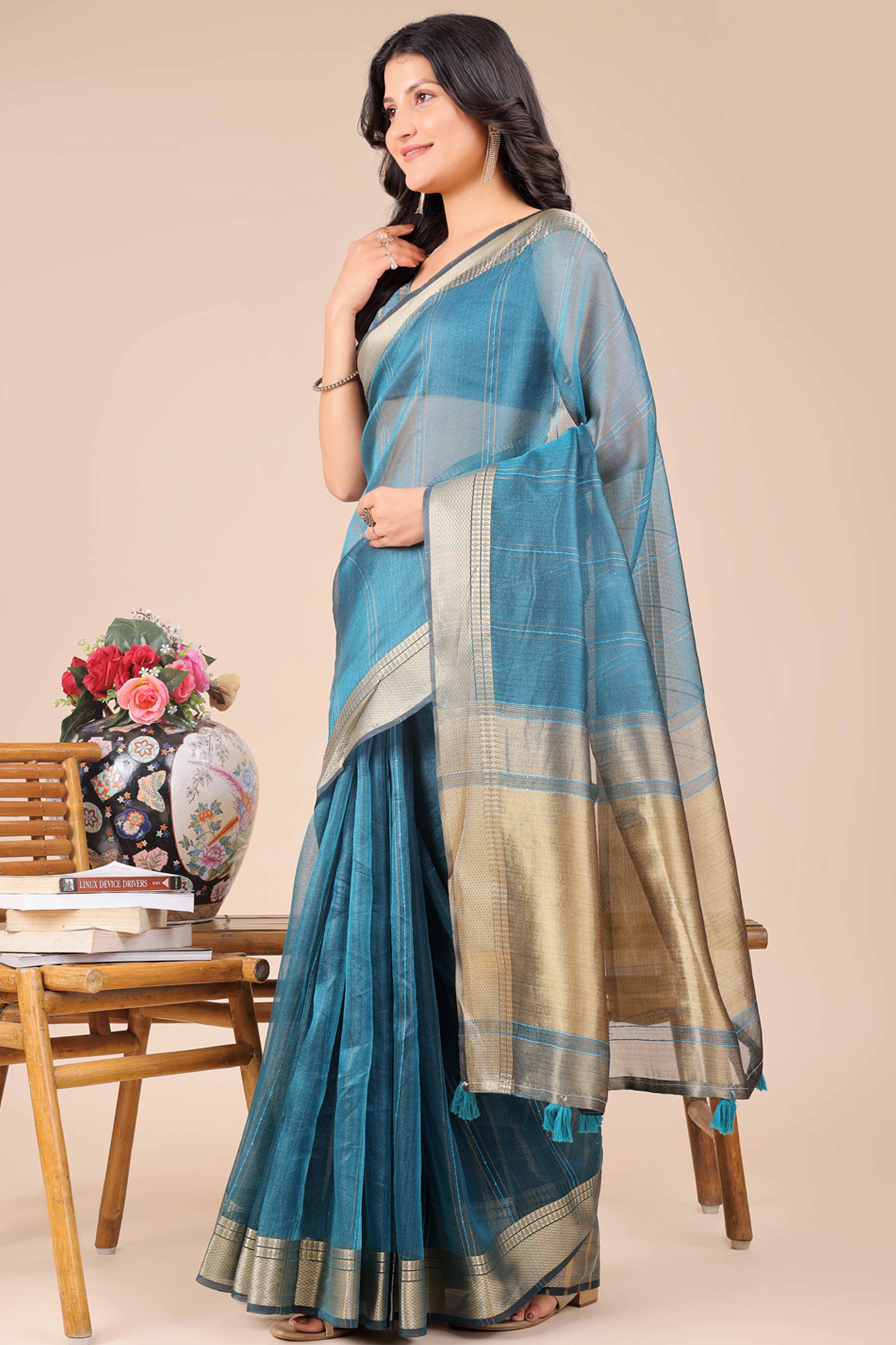 Sky Teal Hue Organza Saree with Shimmering Zari Border Weave