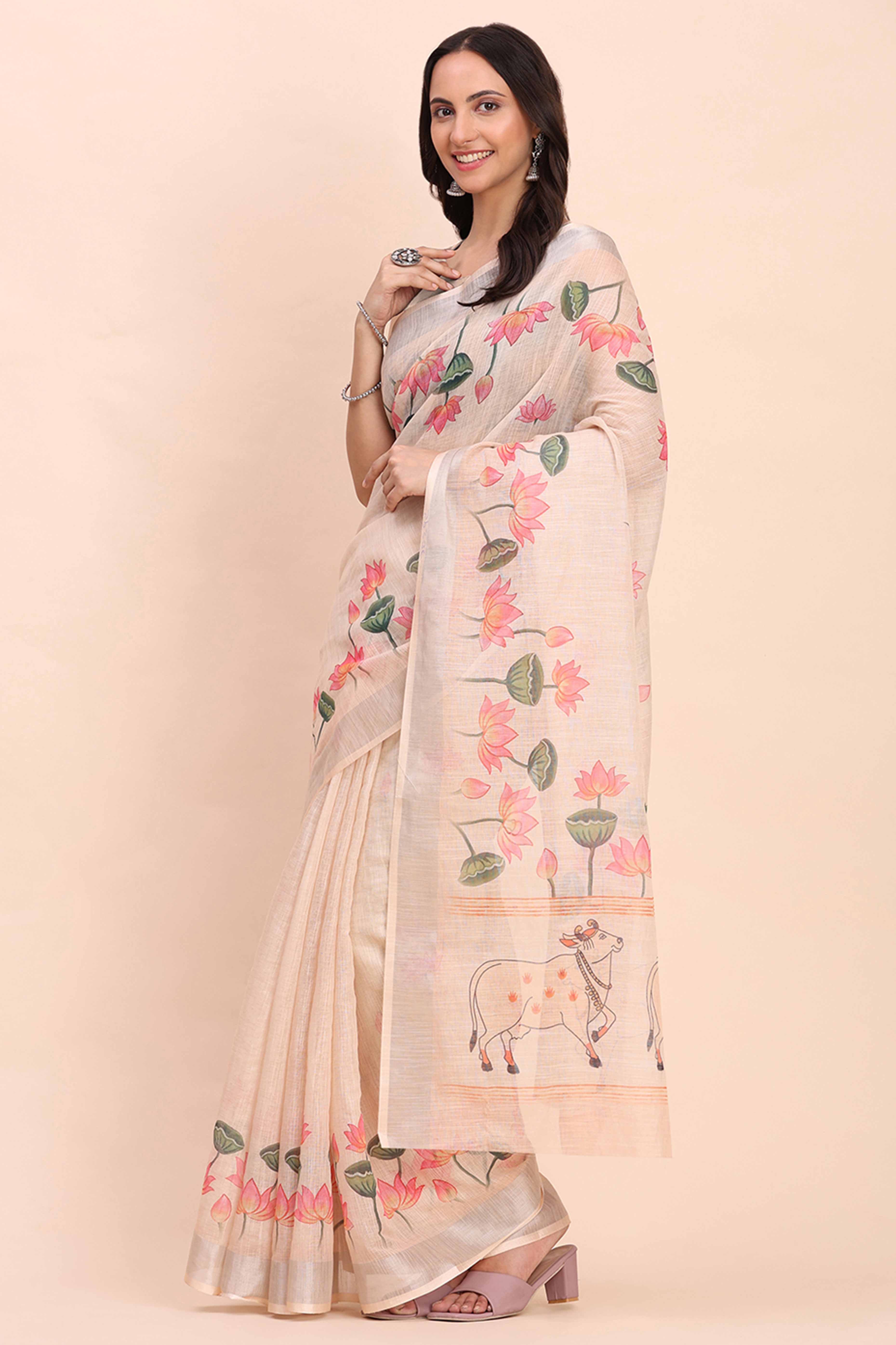 Beige Linen Cotton Saree Featuring Floral Prints & Woven Border