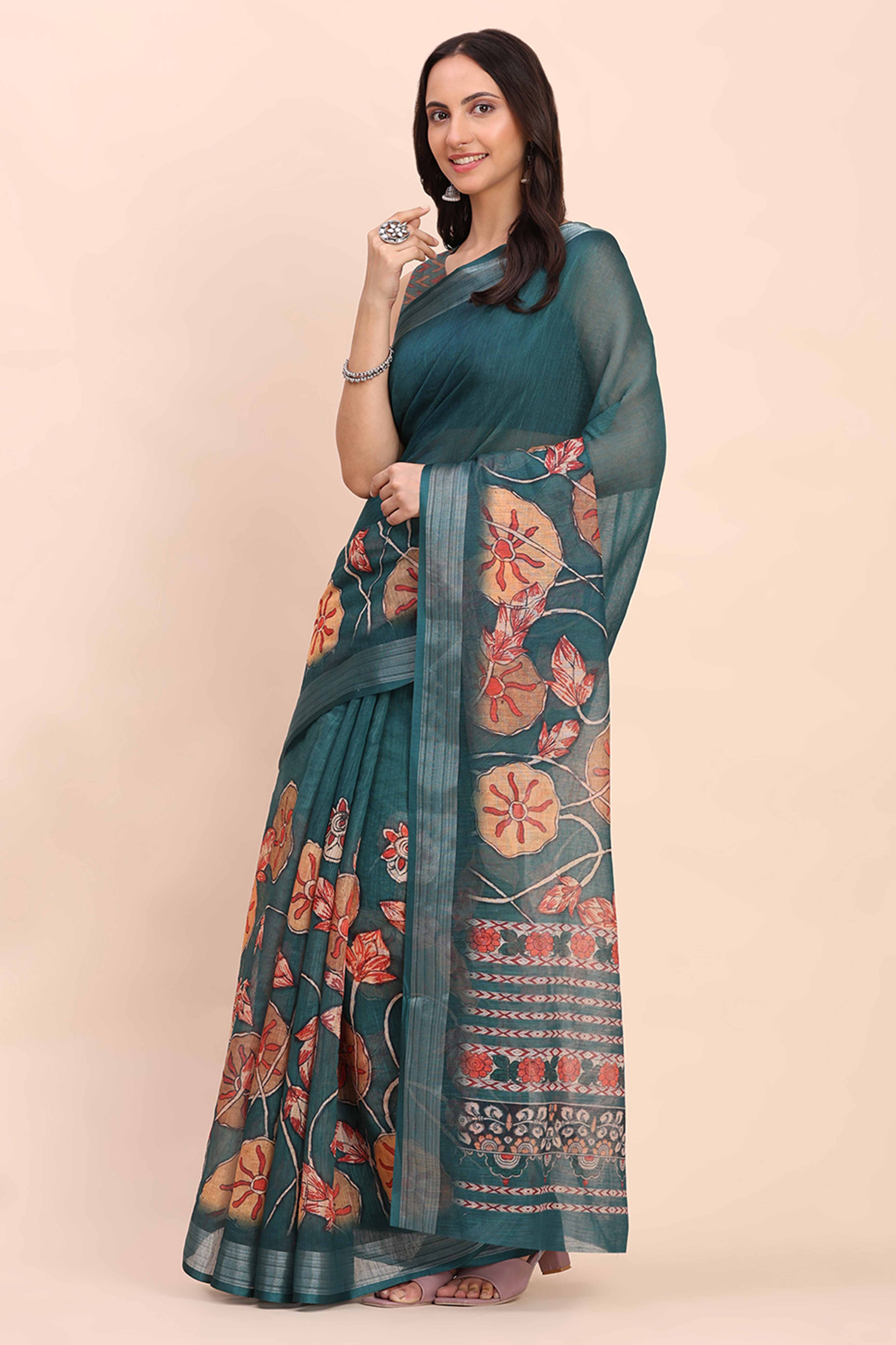 Teal Blue Linen Cotton Saree Featuring Floral Prints & Woven Border