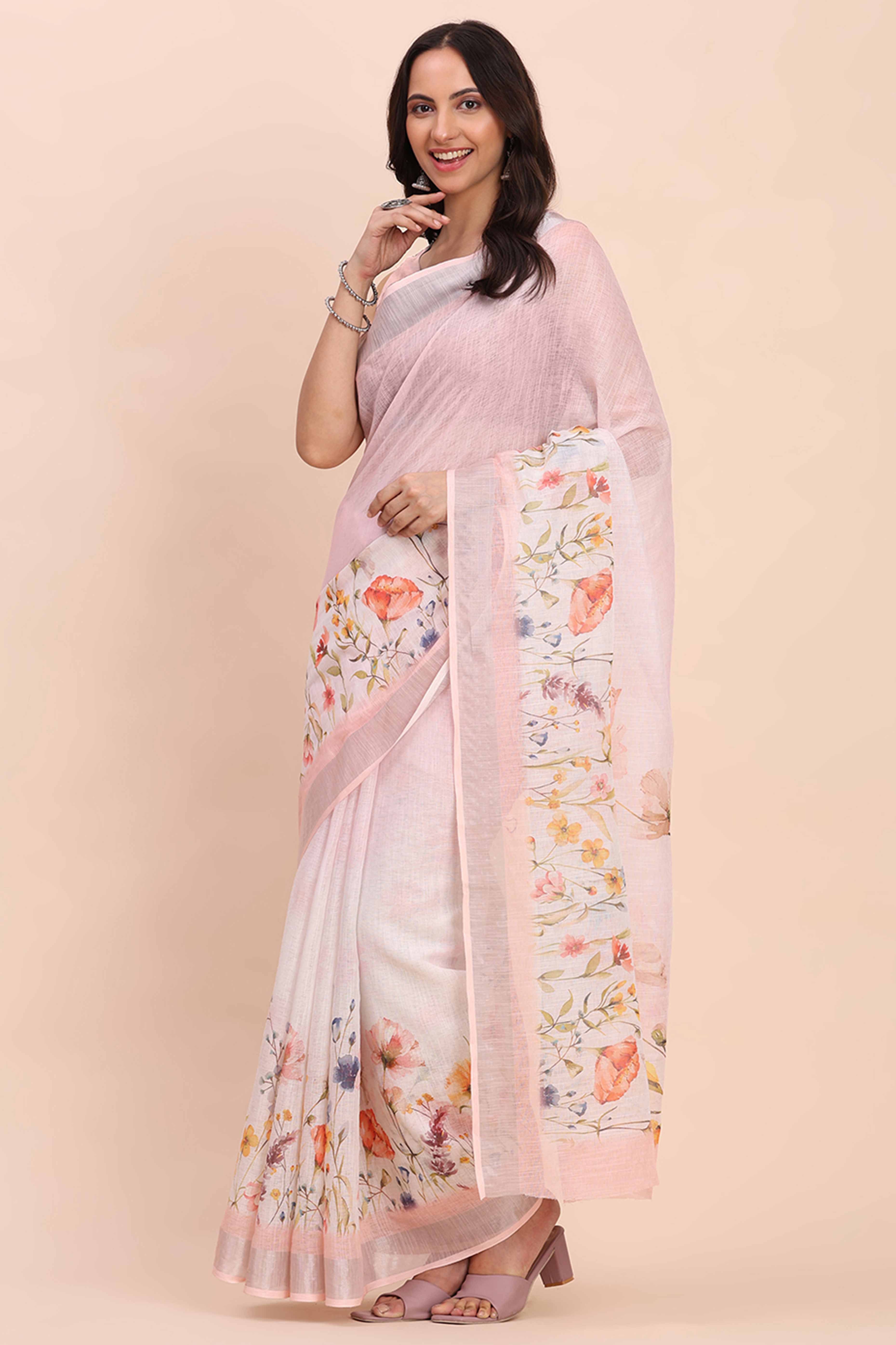 Light Pink Linen Cotton Saree Featuring Floral Prints & Woven Border