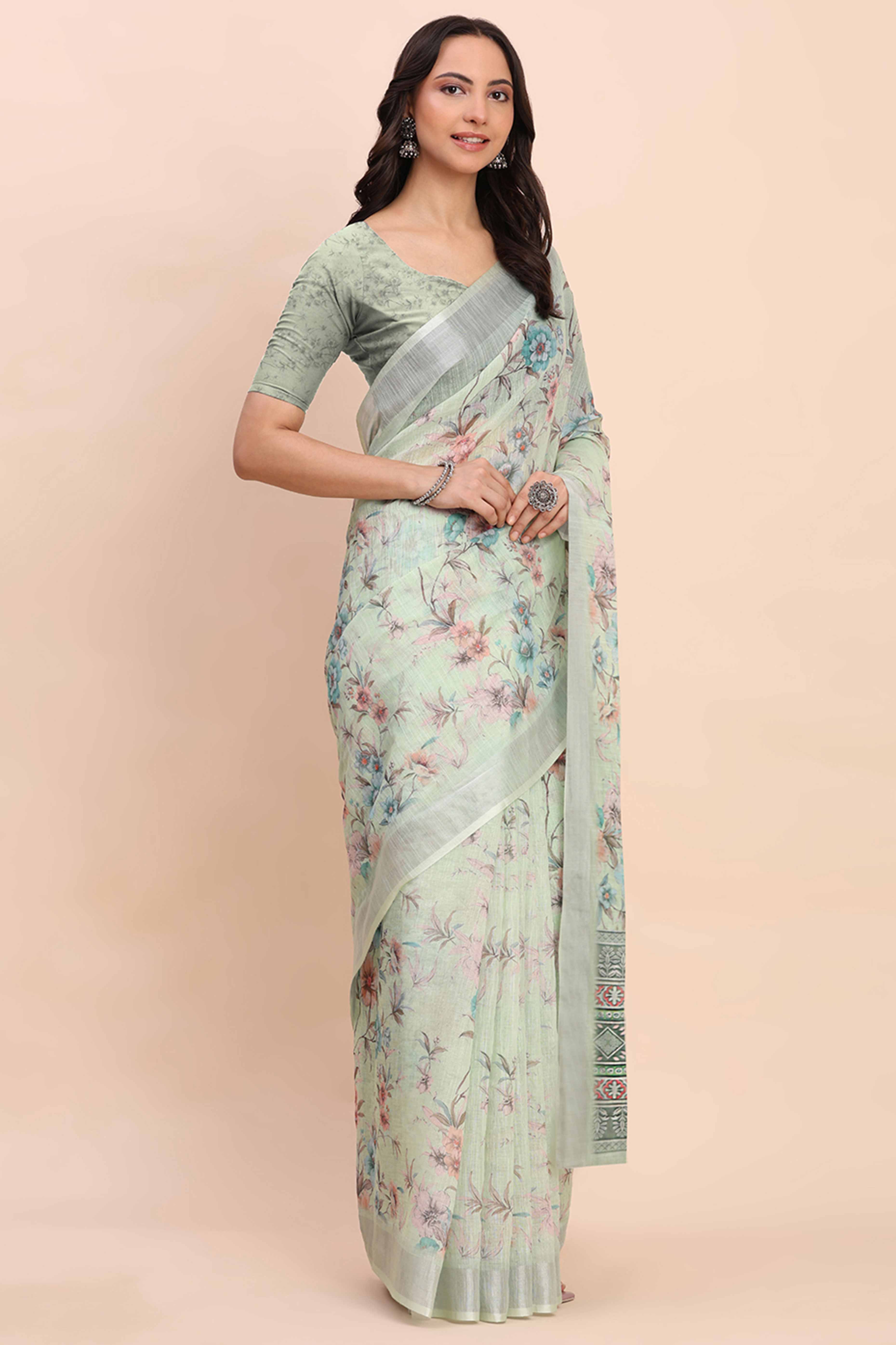 Light Green Linen Cotton Saree Featuring Floral Prints & Woven Border