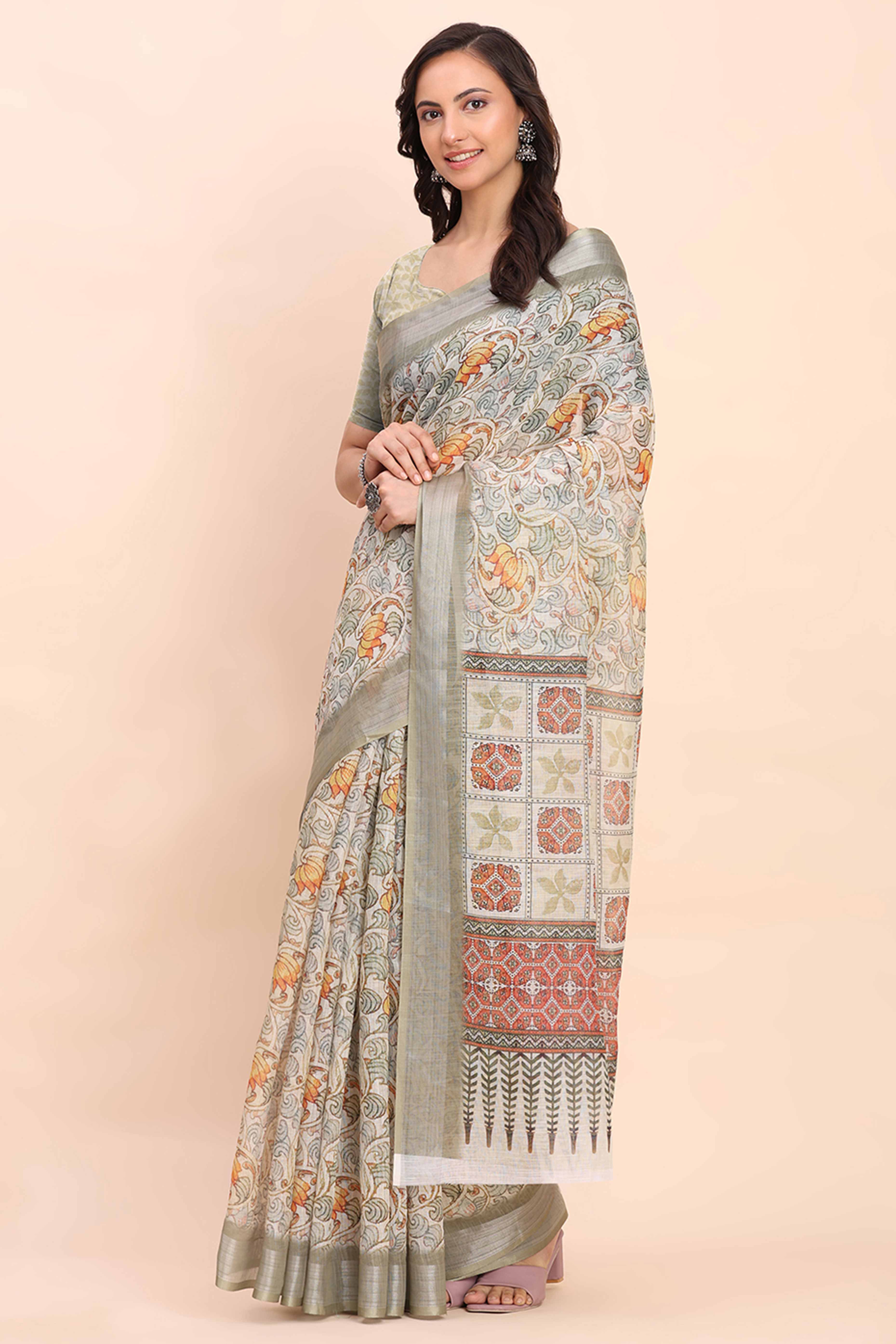 Light Green Linen Cotton Saree Featuring Floral Prints & Woven Border