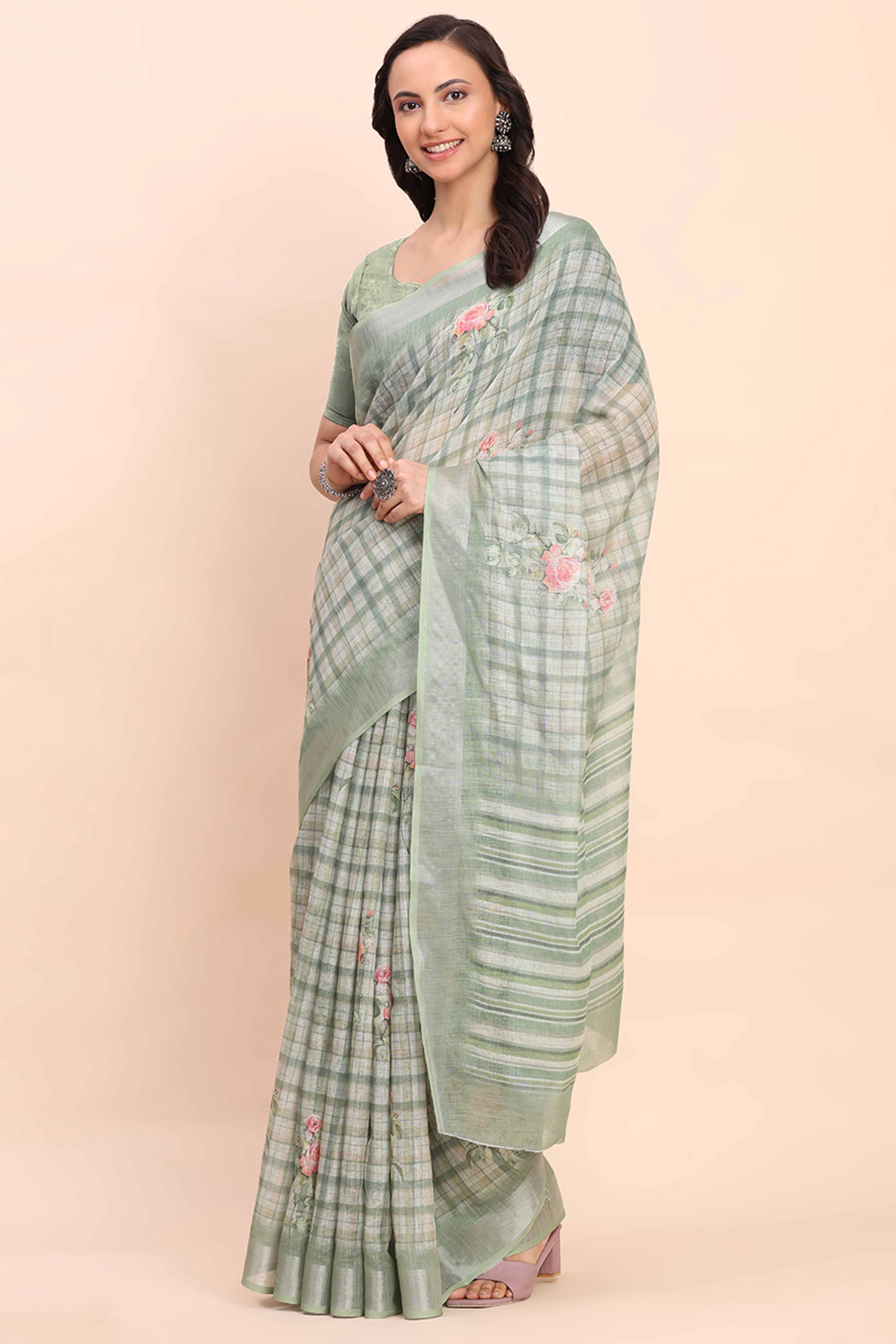 Sea Green Linen Cotton Saree Featuring Floral Prints & Woven Border