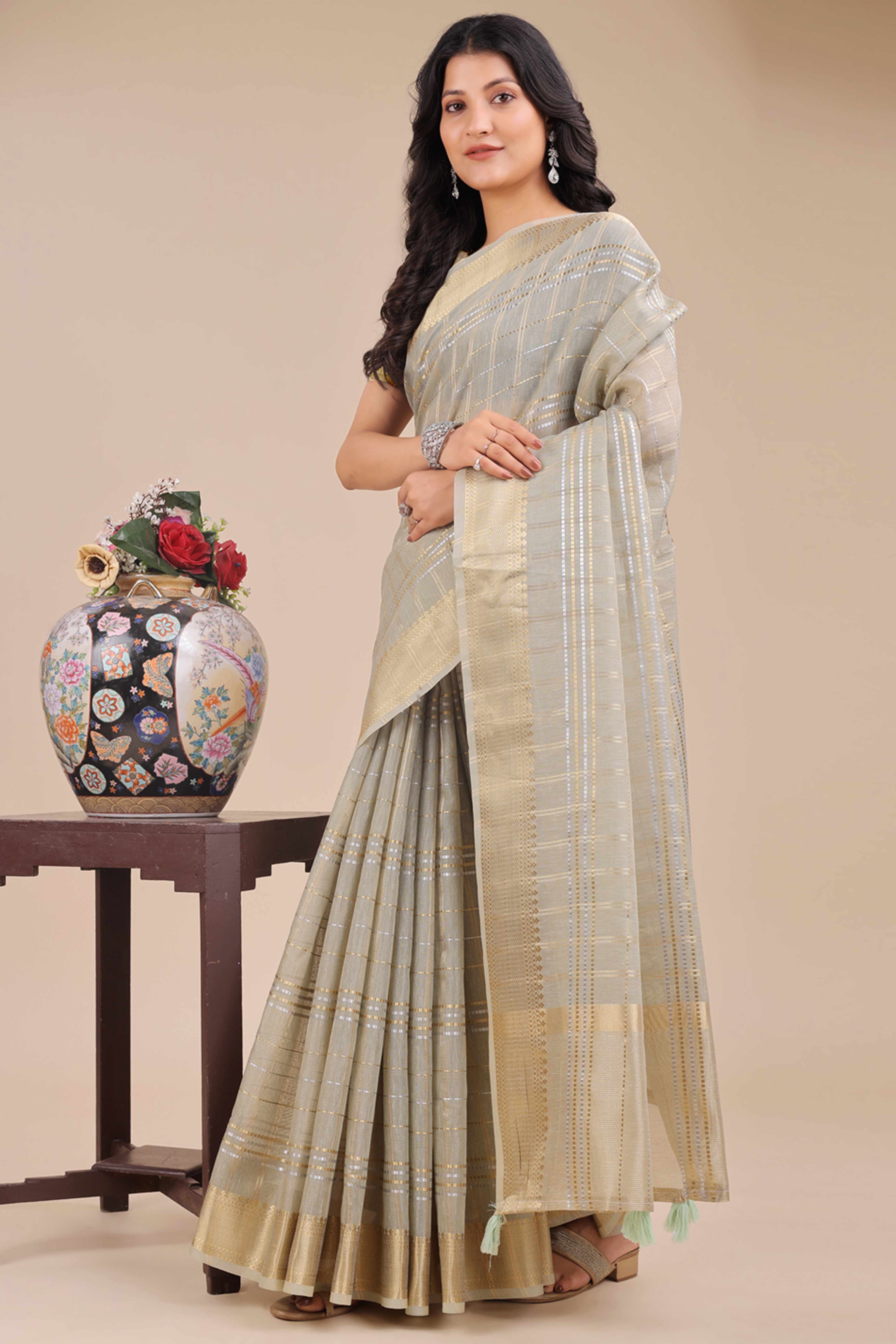 Sea Green Organza Saree with Checkered Zari Weaving and Tassel Detailing