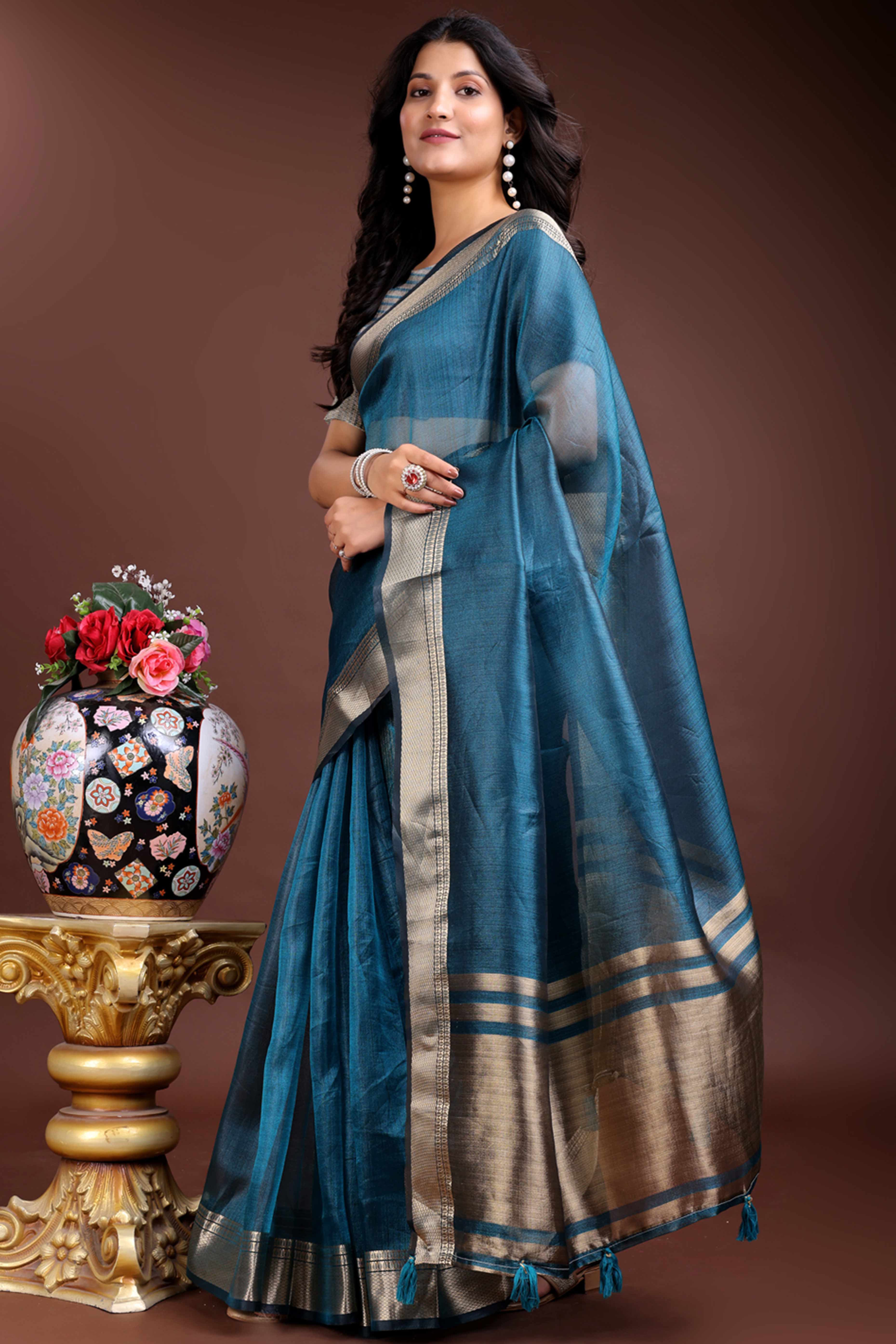 Teal Organza Saree with Zari Border Weaving Grace
