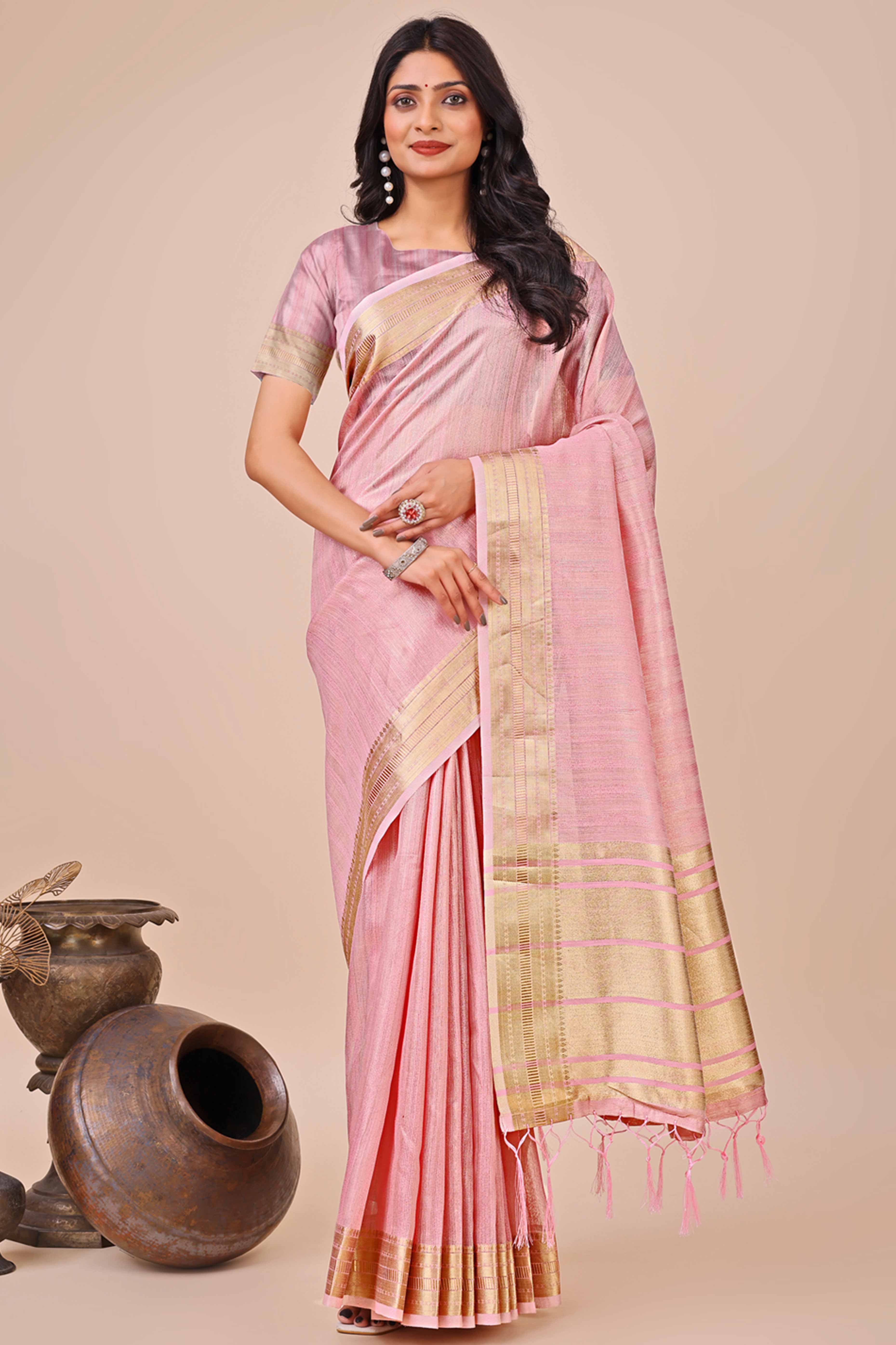 Pink Organza Saree With Intricate Weave & Elegant Tassel Accents