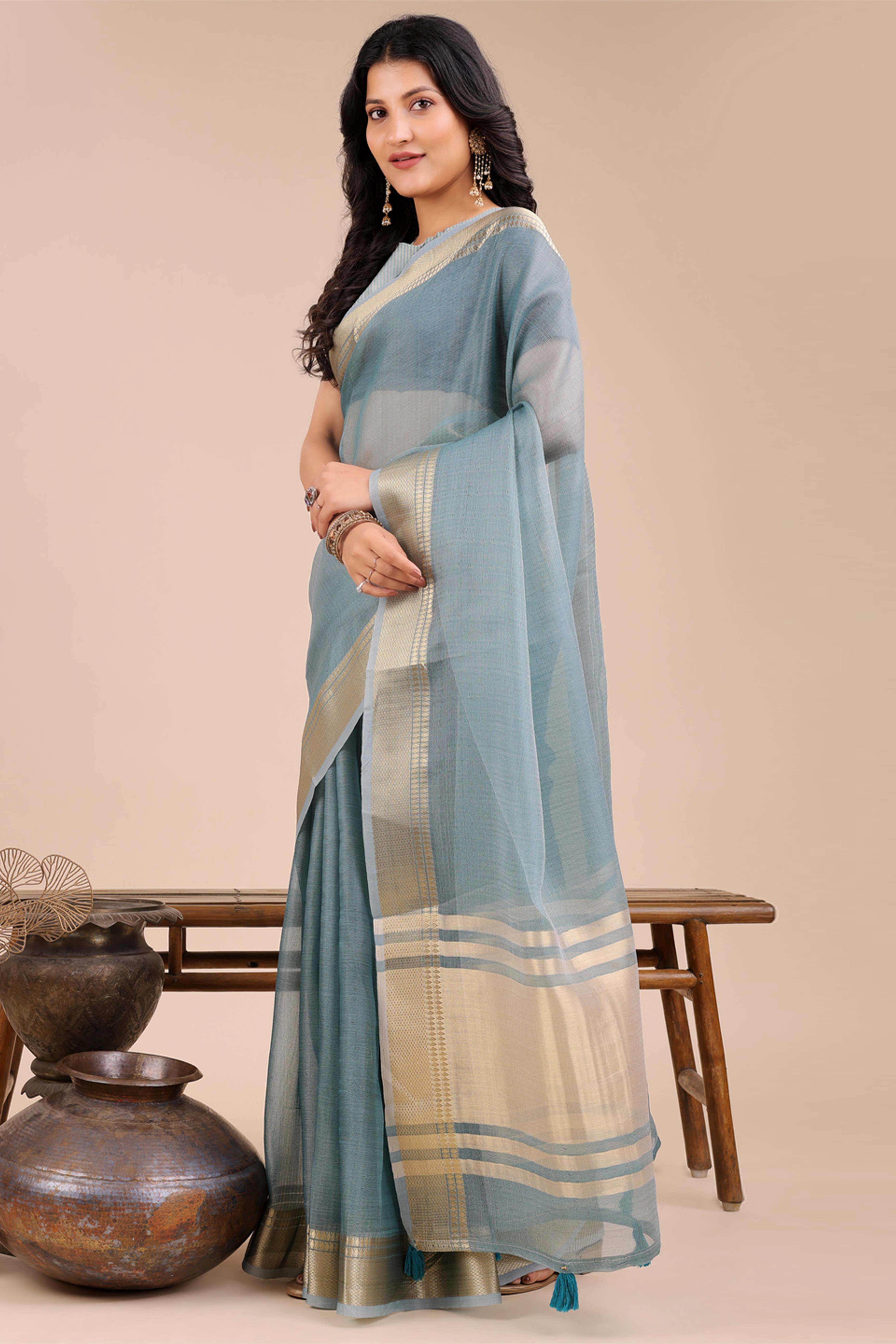Soft Sea Green Organza Saree with Detailed Zari Woven Edging