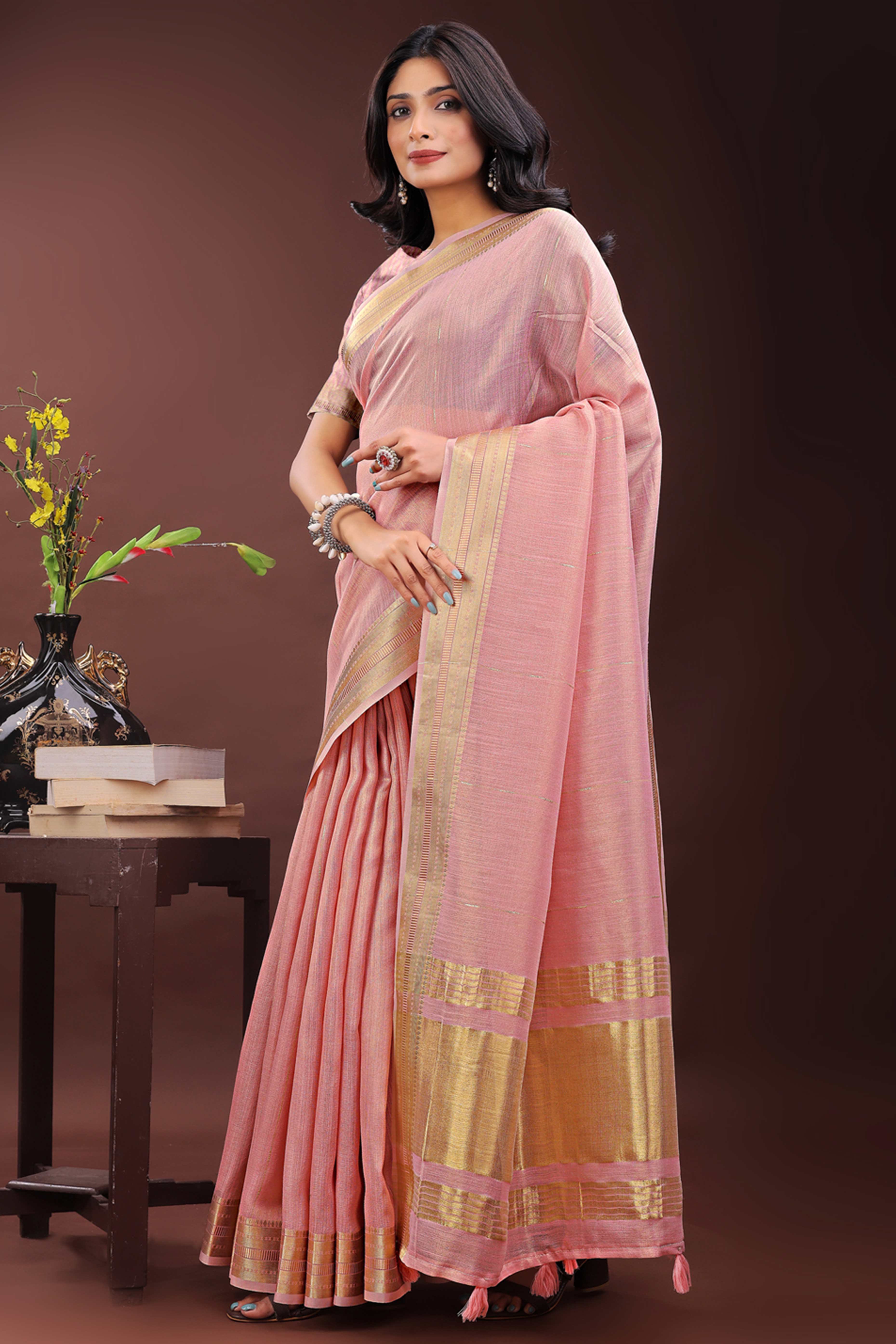 Light Pink Organza Saree Adorned With Zari Weave & Tassel Edges