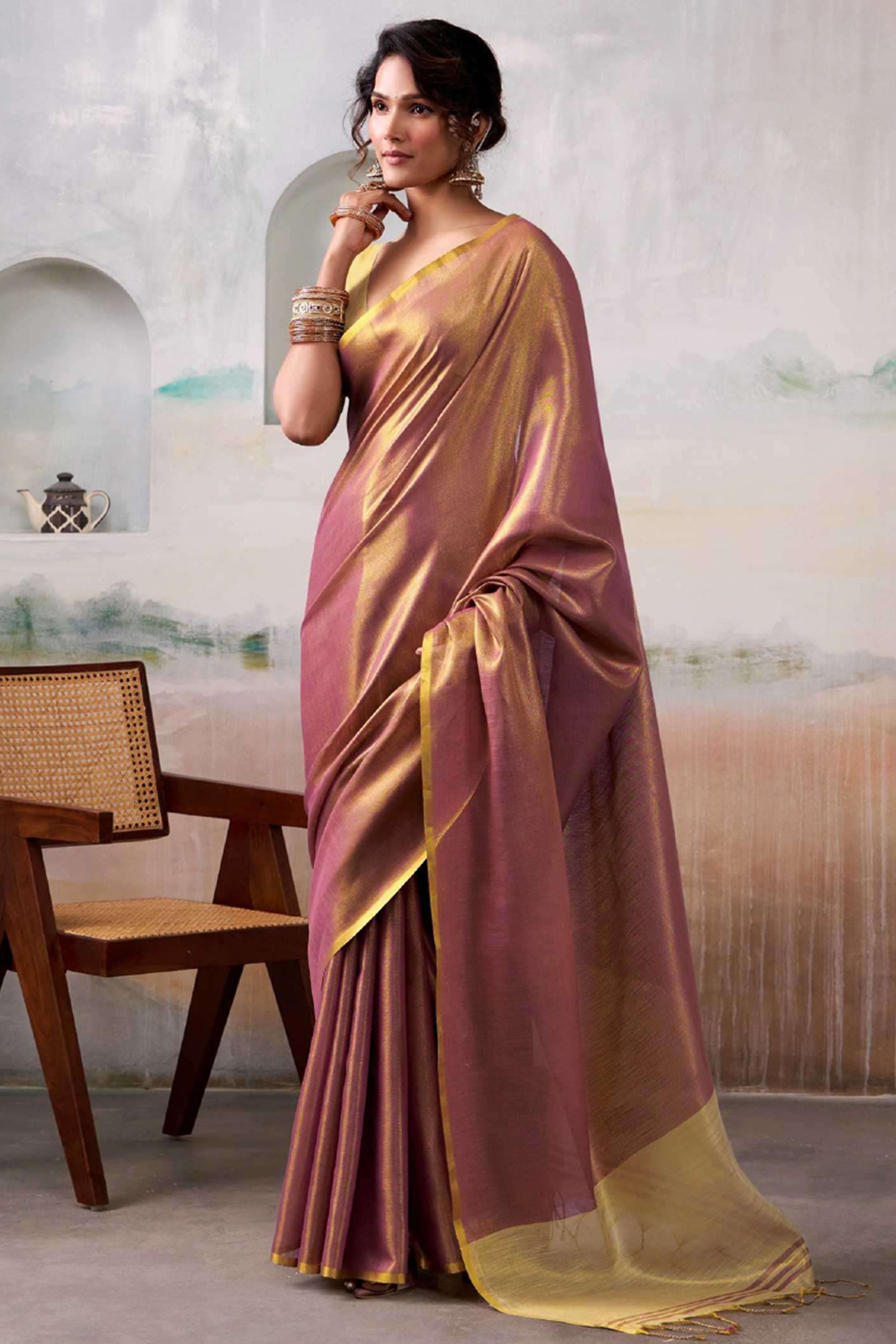 Graceful Purple Tissue Silk Blend Saree Adorned with Intricate Zari Weaving & Tassel Pallu