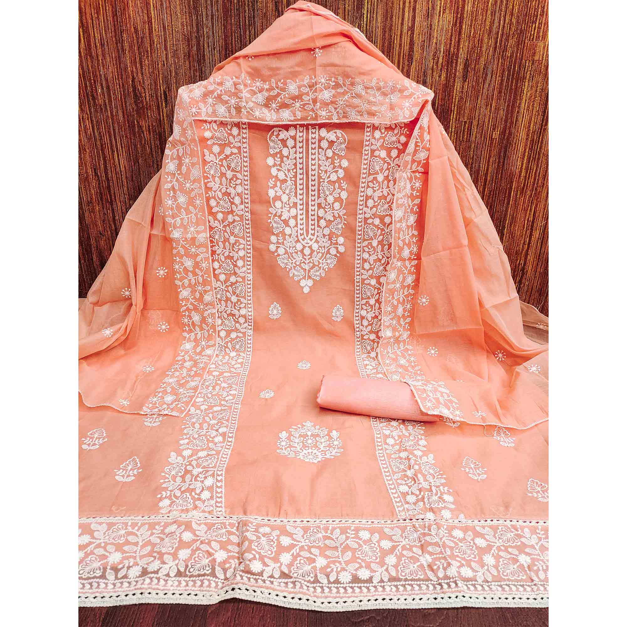 Orange Cotton Blend Unstitched Suit Set Highlighted with Soft Floral Embroidery