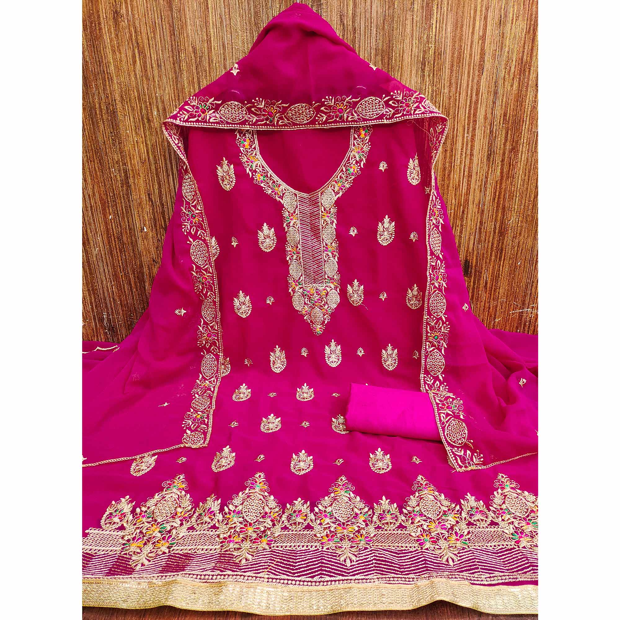 Rani Pink Designer Georgette Dress Material Adorned With Intricate Floral Embroidery