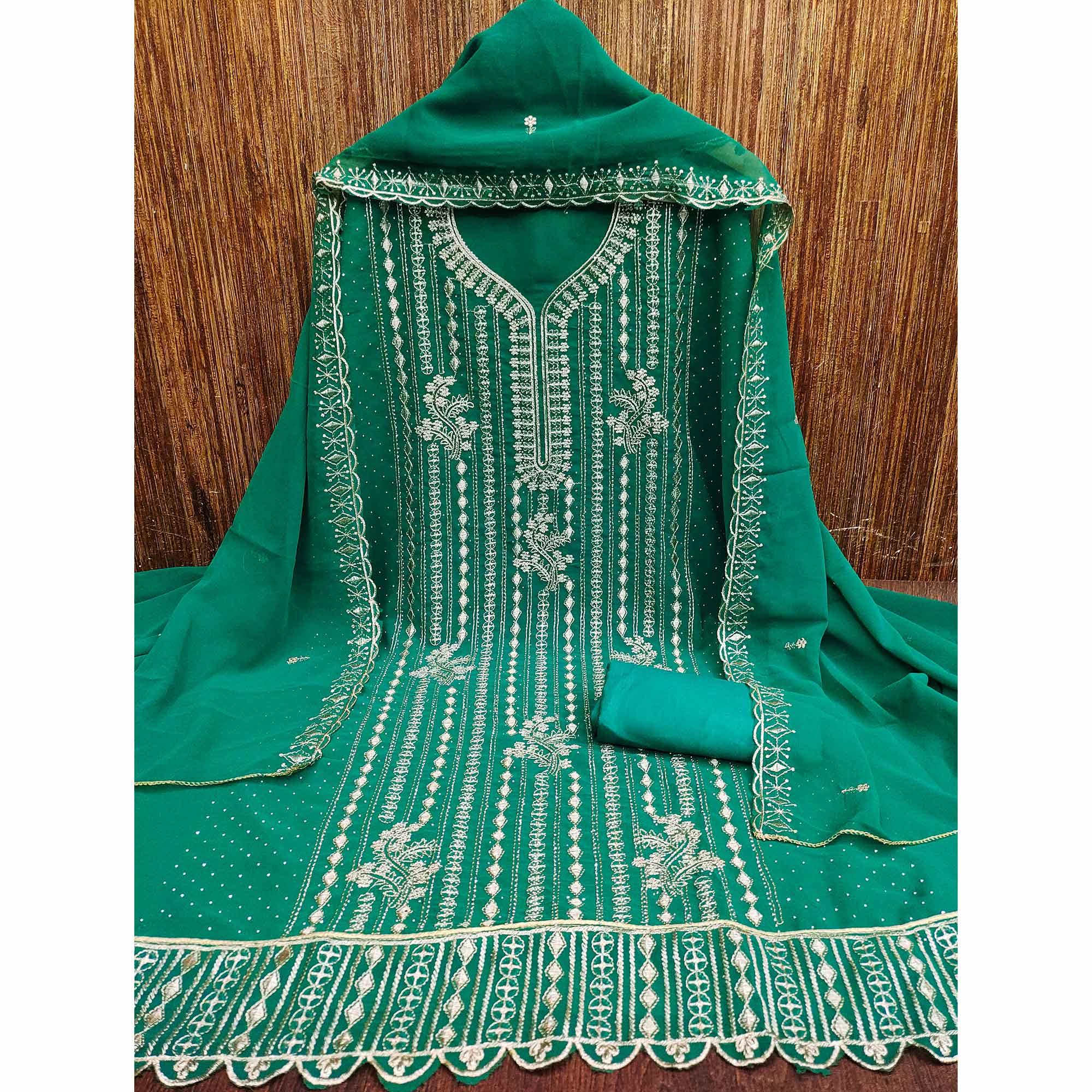 Rama Green Georgette Dress Material with Opulent Threadwork