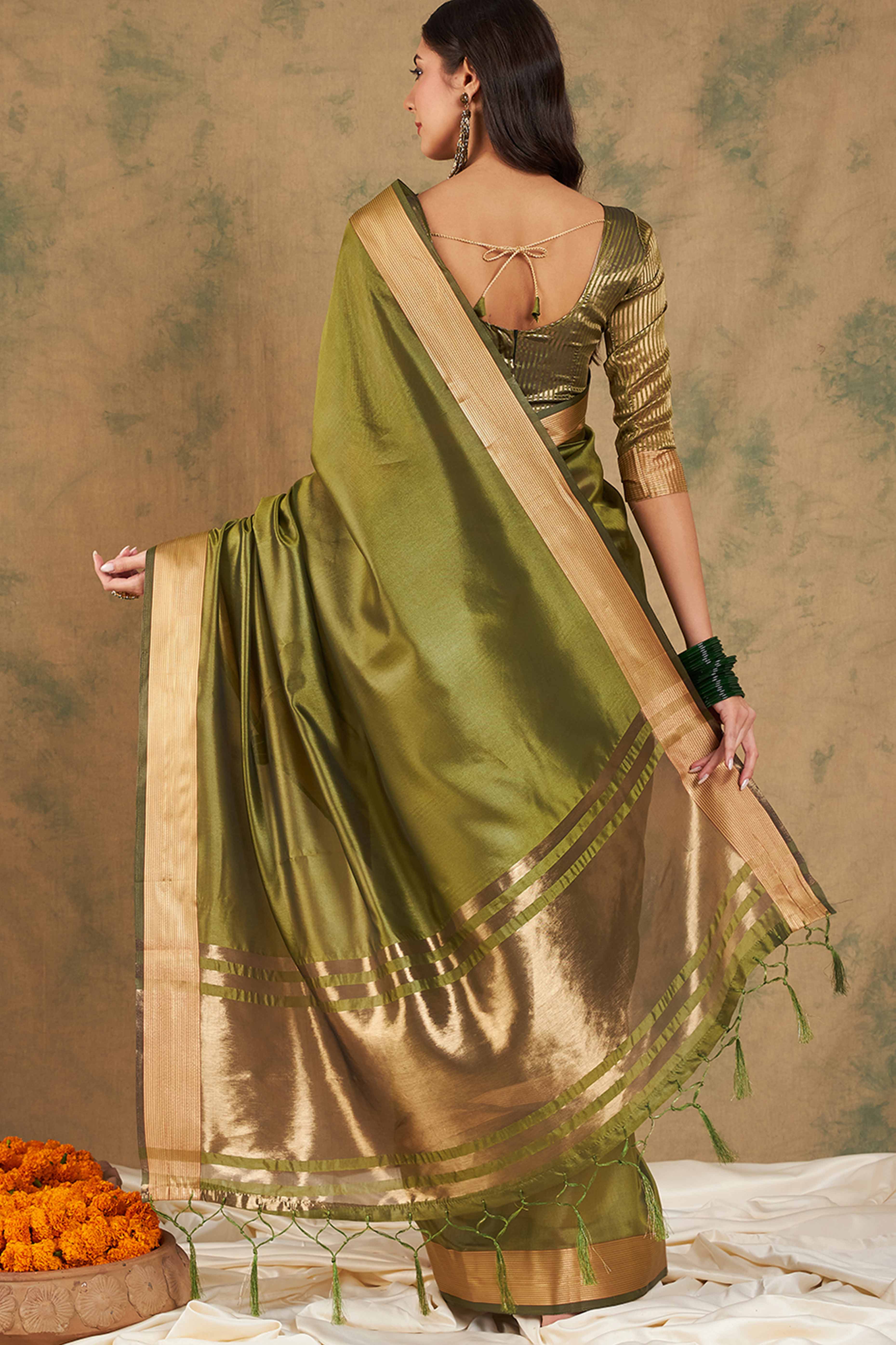 Green Organza Saree In Organza With Delicate Weaving Border And Tassel Details