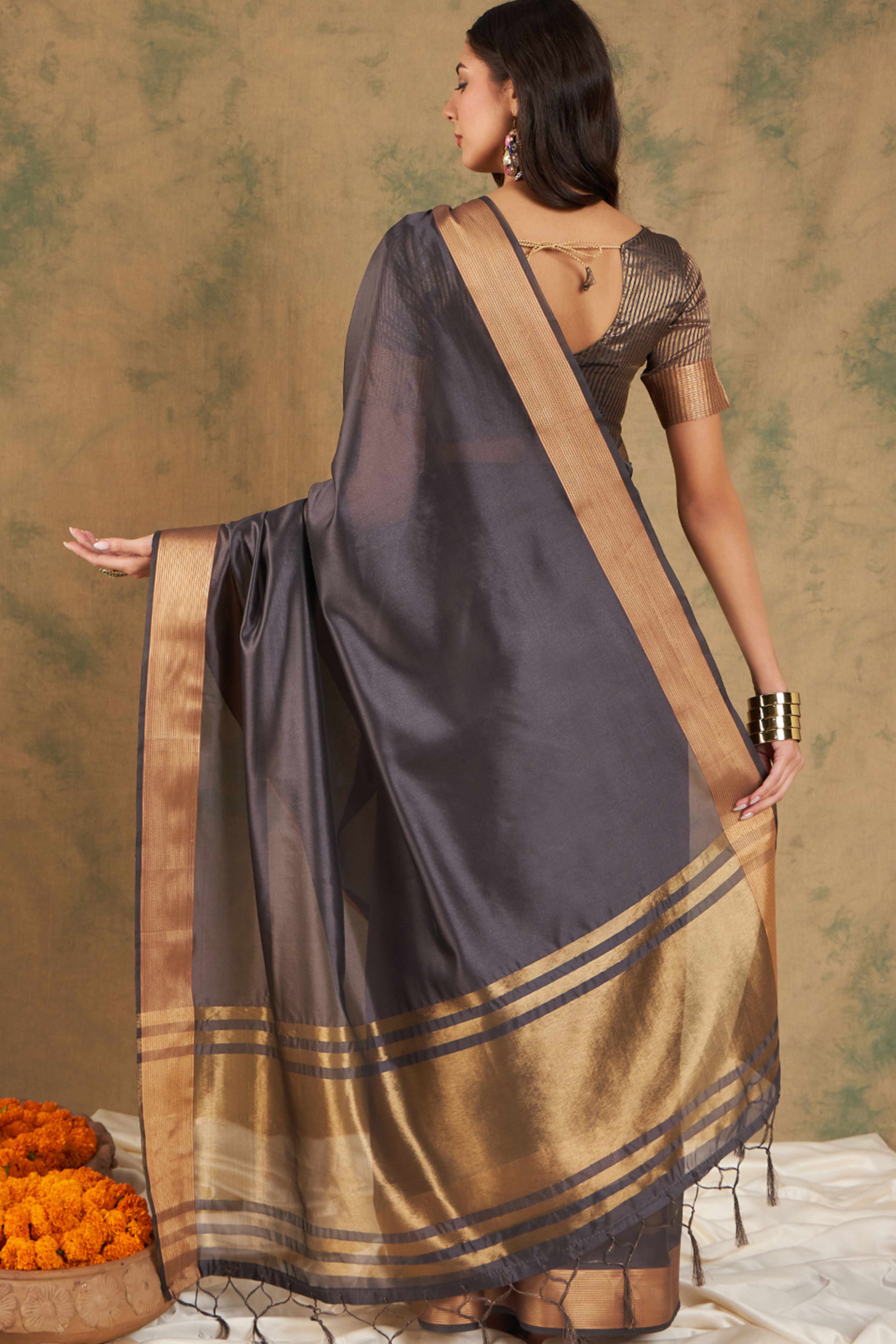 Grey Organza Saree In Organza With Delicate Weaving Border And Tassel Details