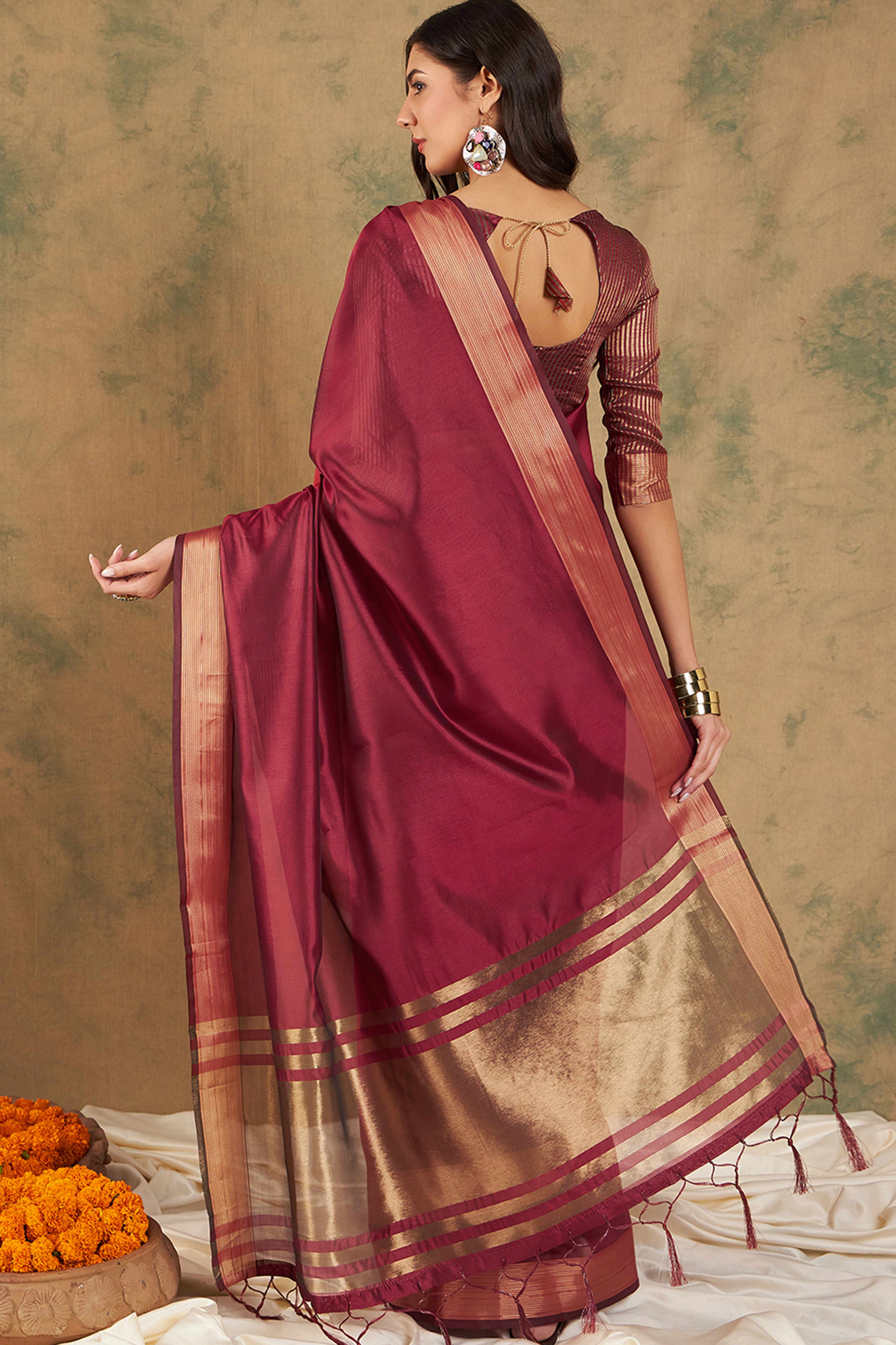 Maroon Organza Saree In Organza With Delicate Weaving Border And Tassel Details