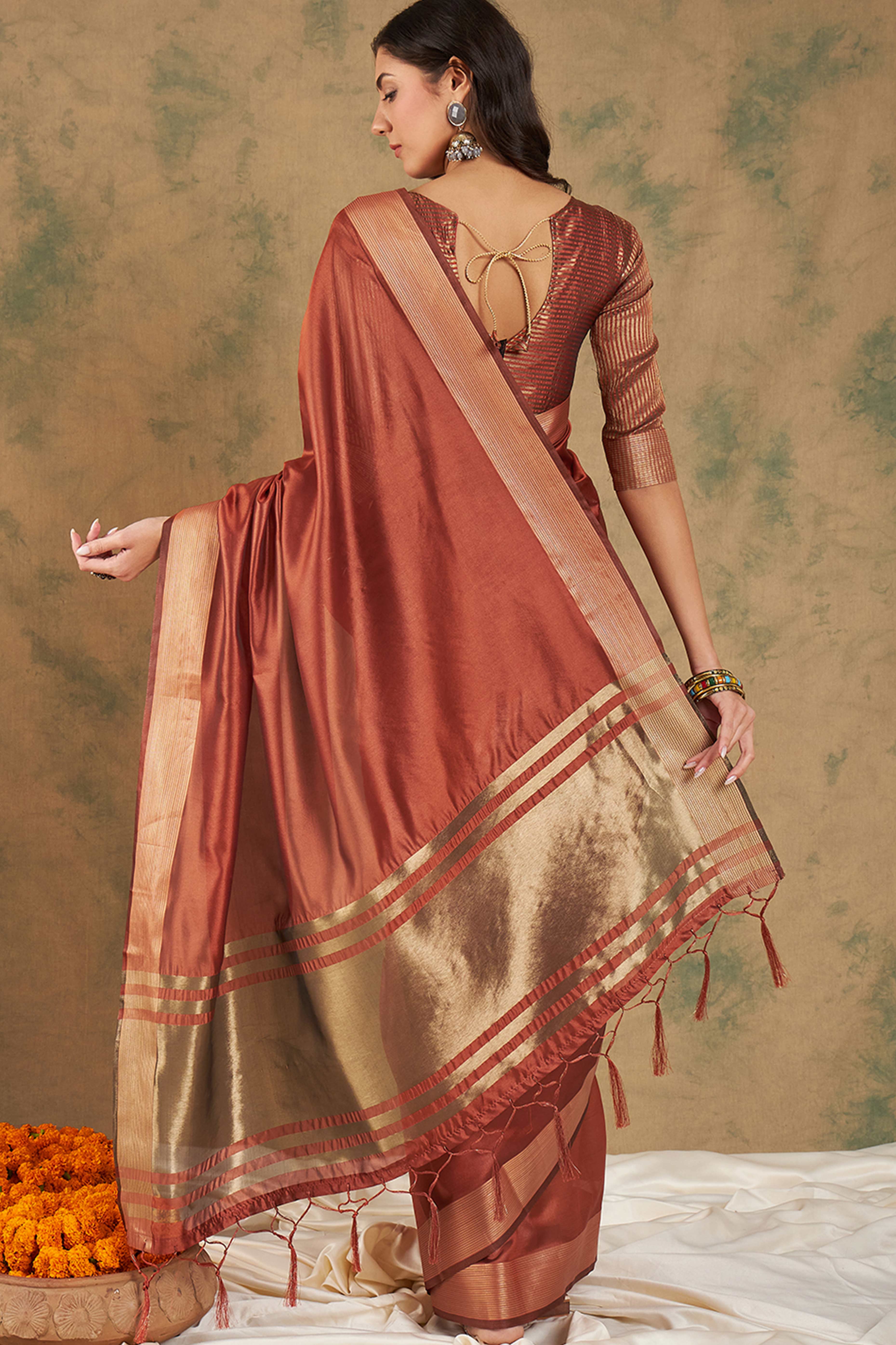 Rust Organza Saree In Organza With Delicate Weaving Border And Tassel Details