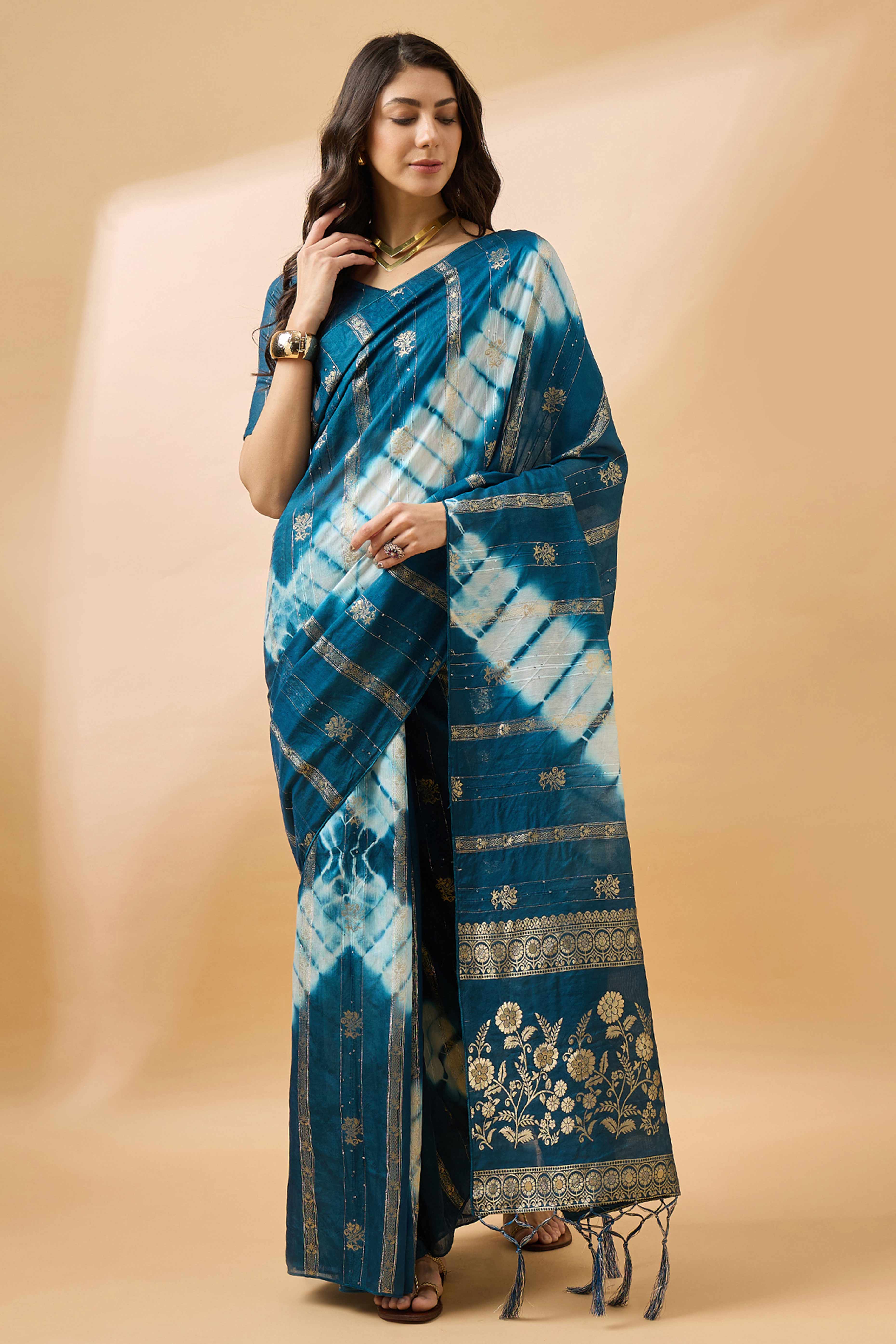 Blue Floral Woven Staple Cotton Blend Saree Highlighted With Sequins Embroidery & Tasselled Pallu
