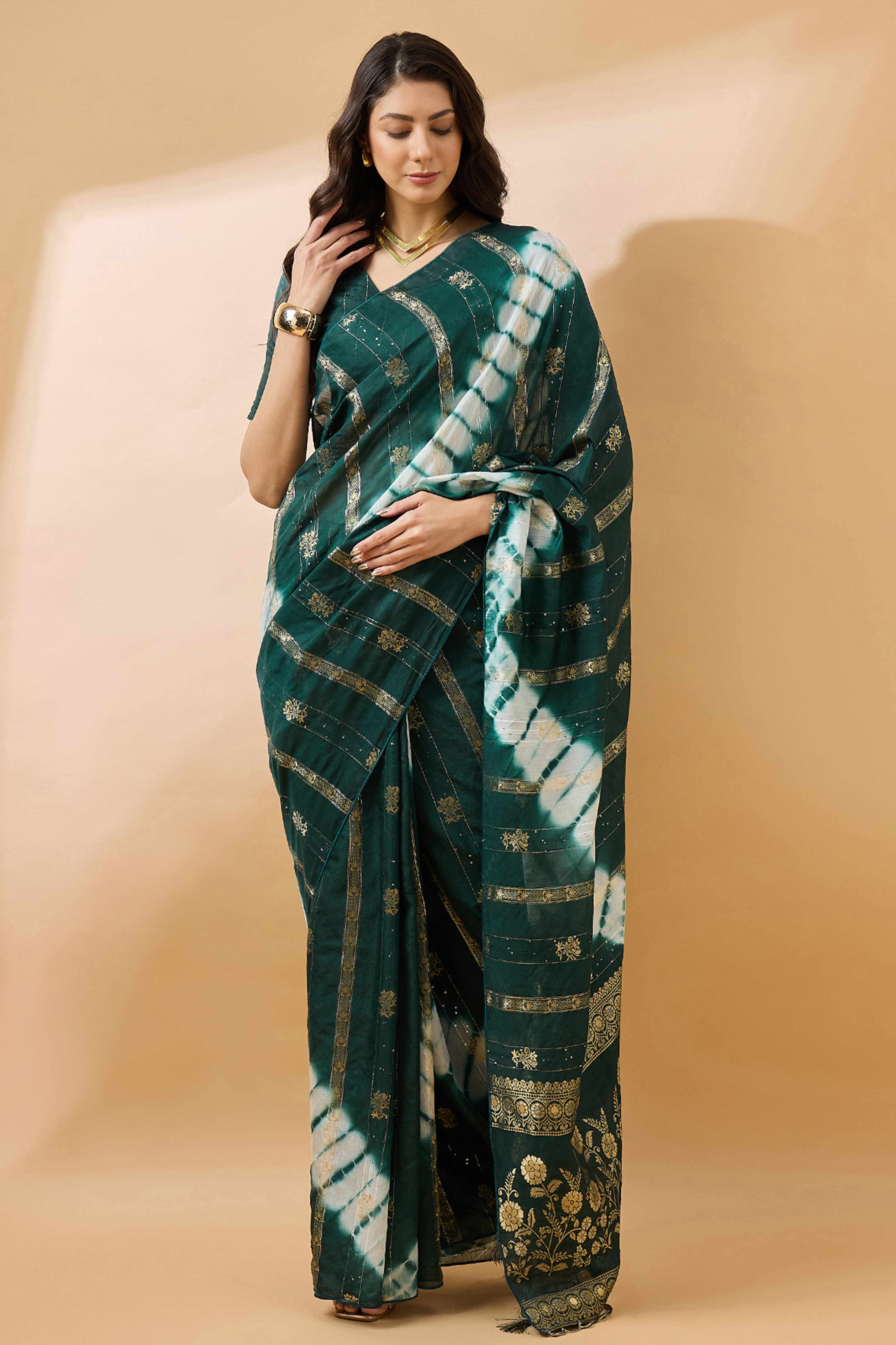 Green Floral Woven Staple Cotton Blend Saree Highlighted With Sequins Embroidery & Tasselled Pallu