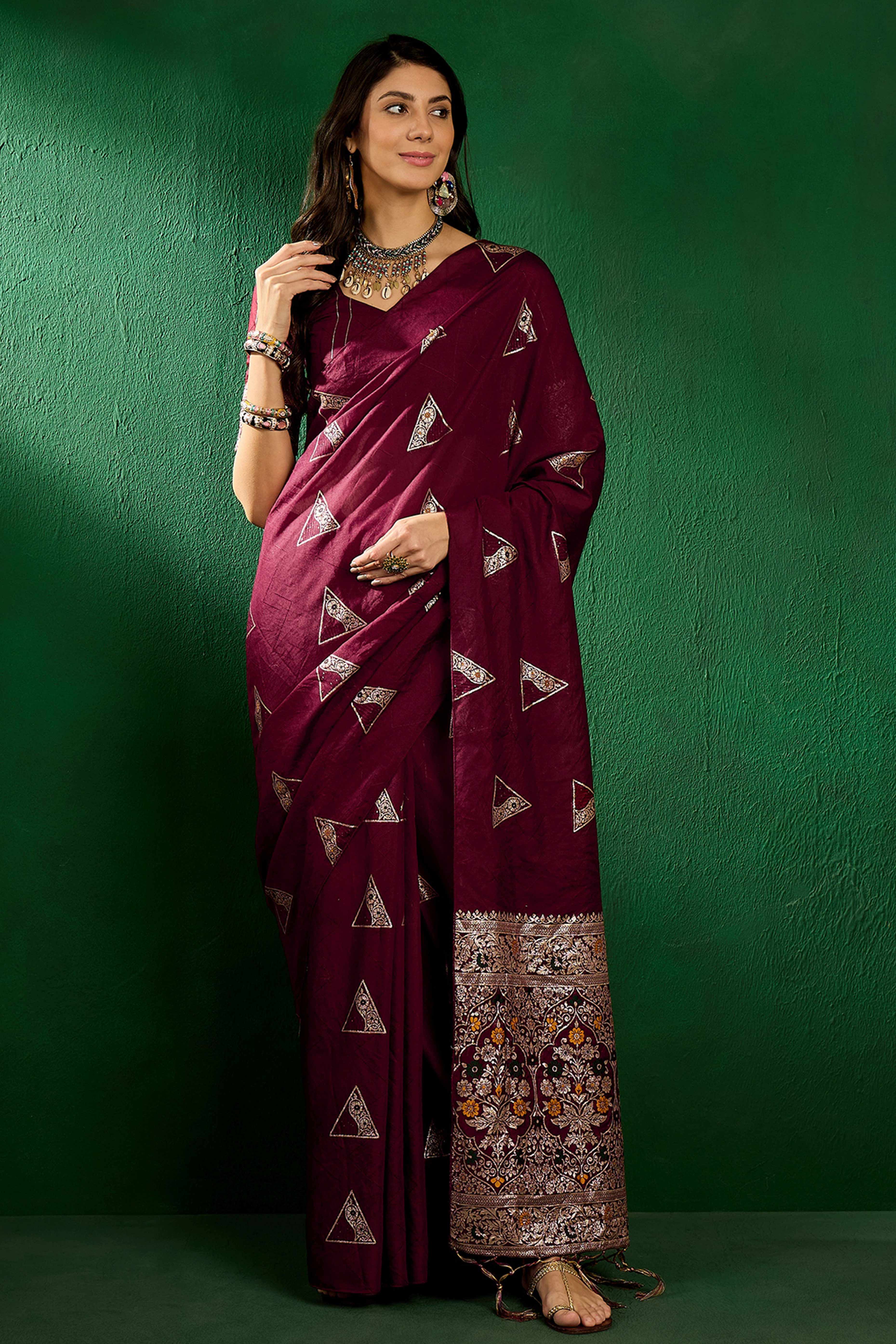 Wine Floral Woven Staple Cotton Blend Saree With Sparkling Sequin Embroidery & Graceful Tassel Pallu