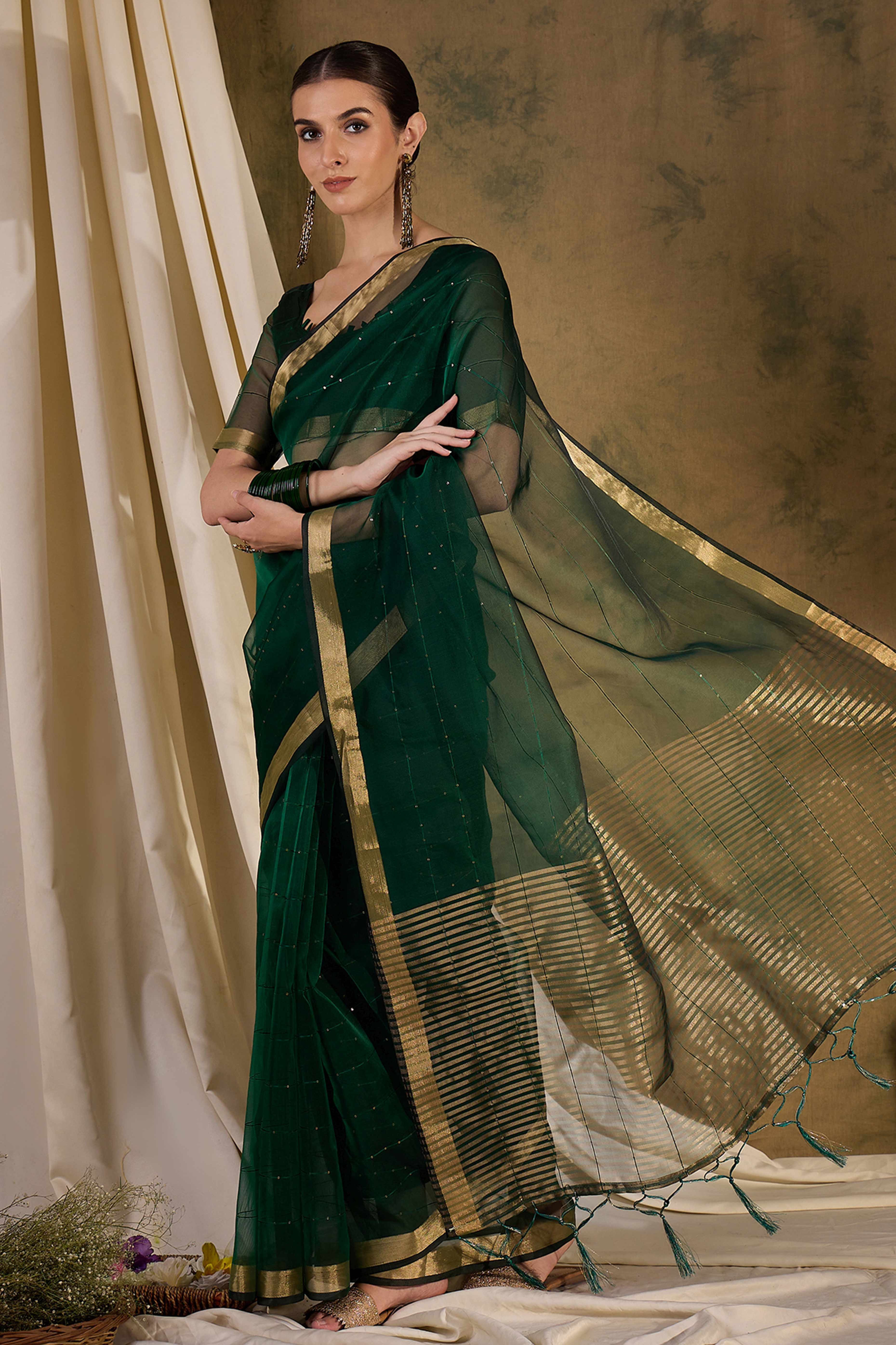 Green Organza Silk Saree Featuring Shimmering Sequins Embroidery & Elegant Tasselled Pallu