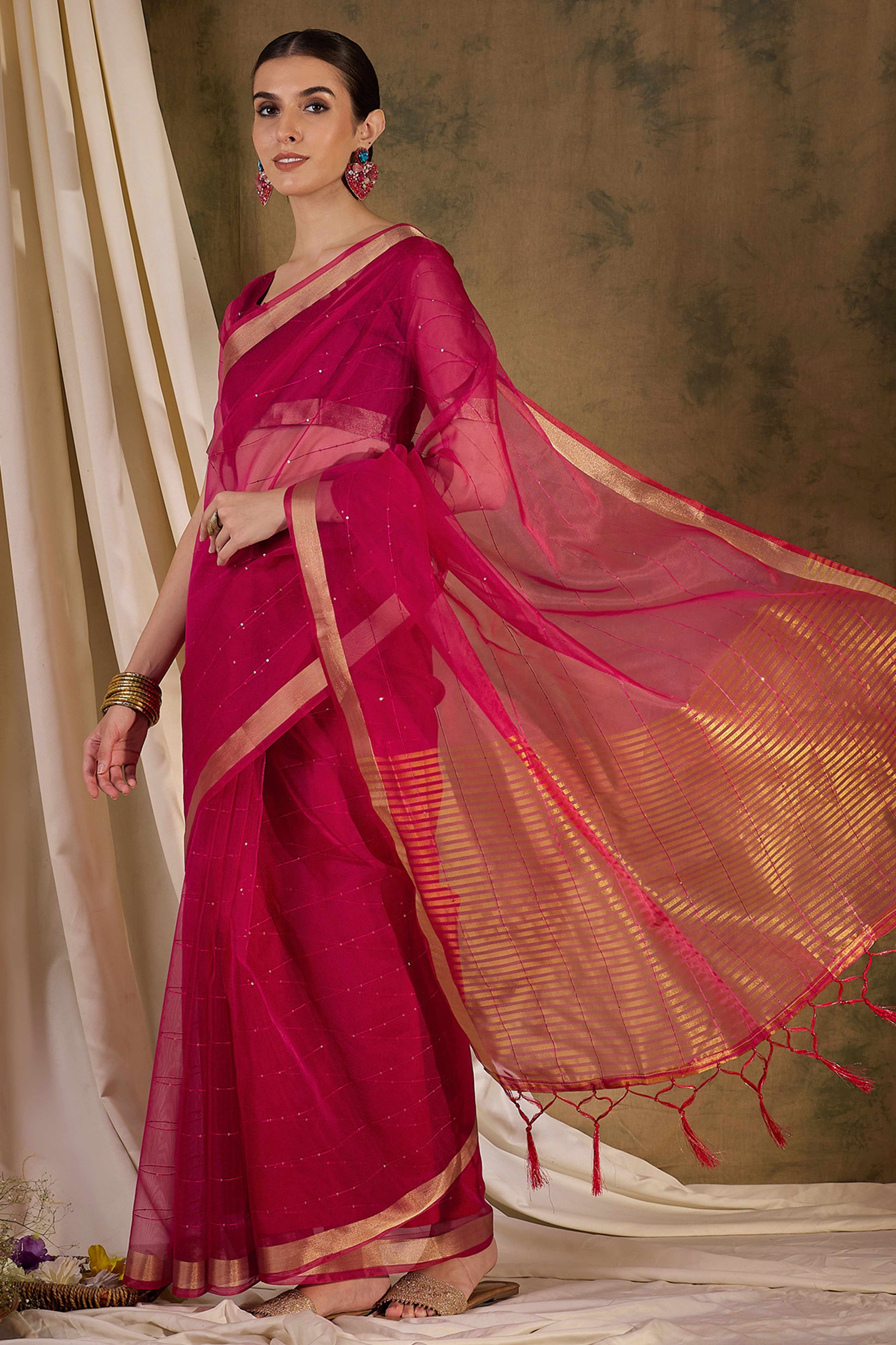 Pink Organza Silk Saree Featuring Shimmering Sequins Embroidery & Elegant Tasselled Pallu