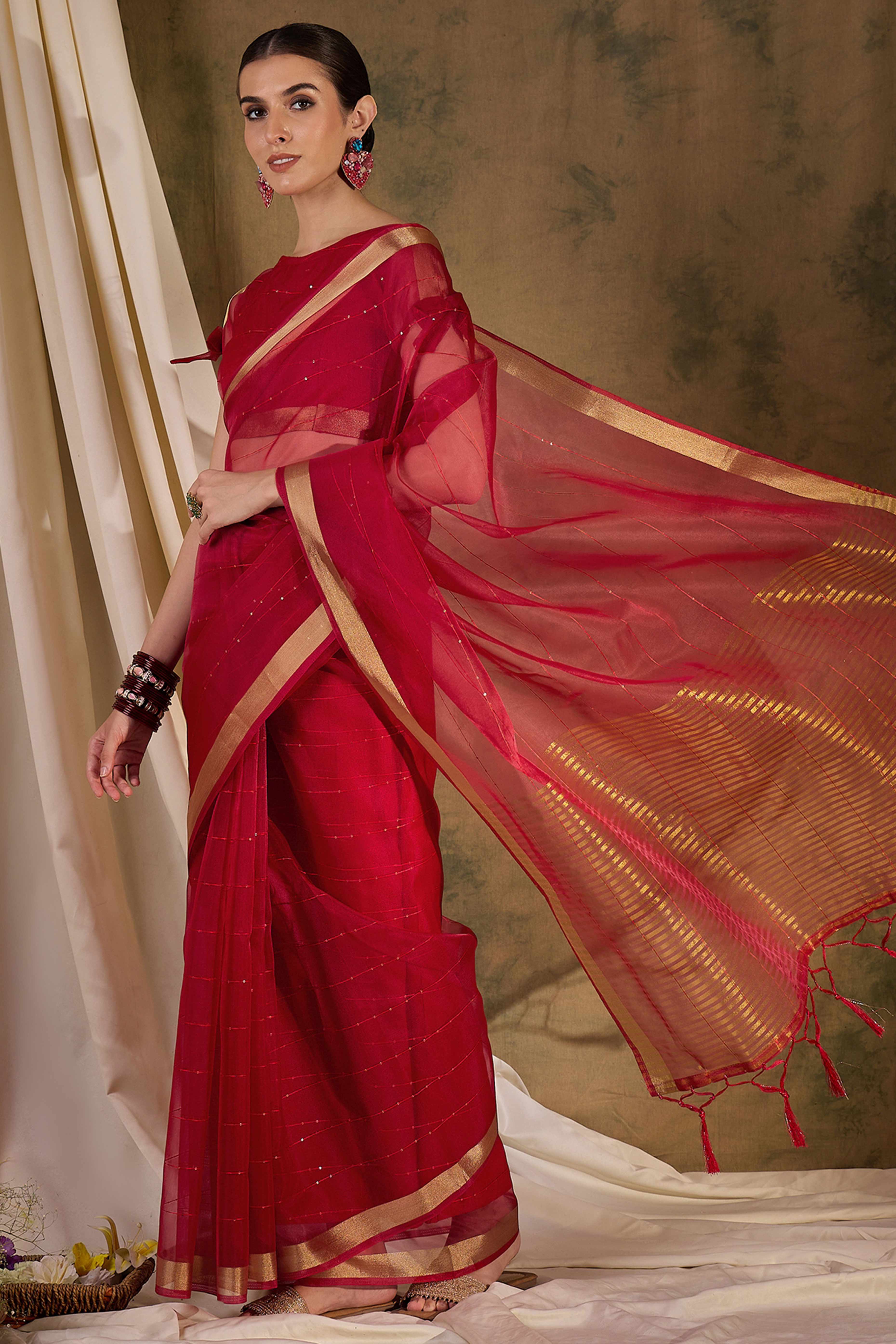 Red Organza Silk Saree Featuring Shimmering Sequins Embroidery & Elegant Tasselled Pallu