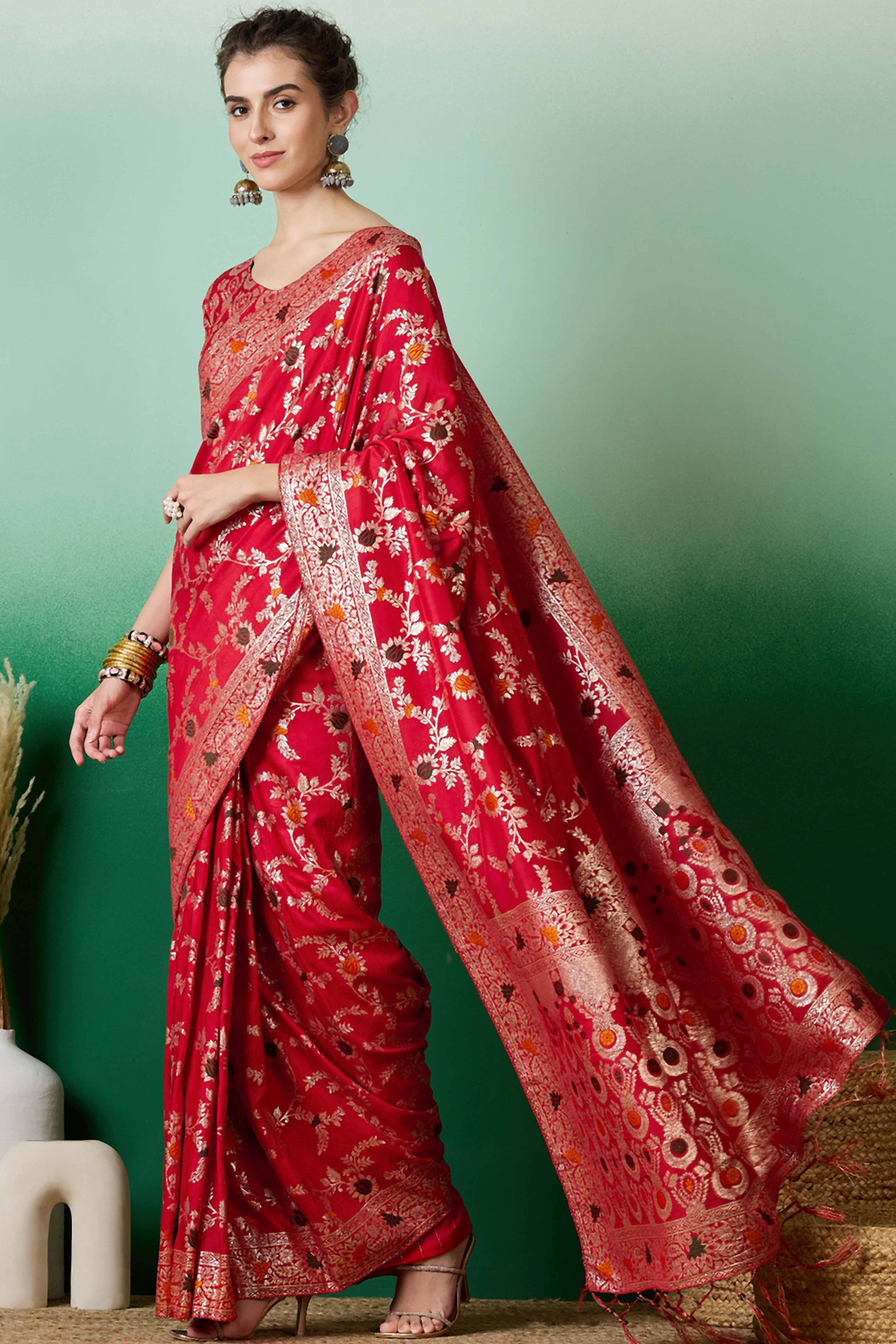 Red Cotton Meena jacquard Saree Featuring Intricate Floral Weaving & Playful Tassels On The Pallu