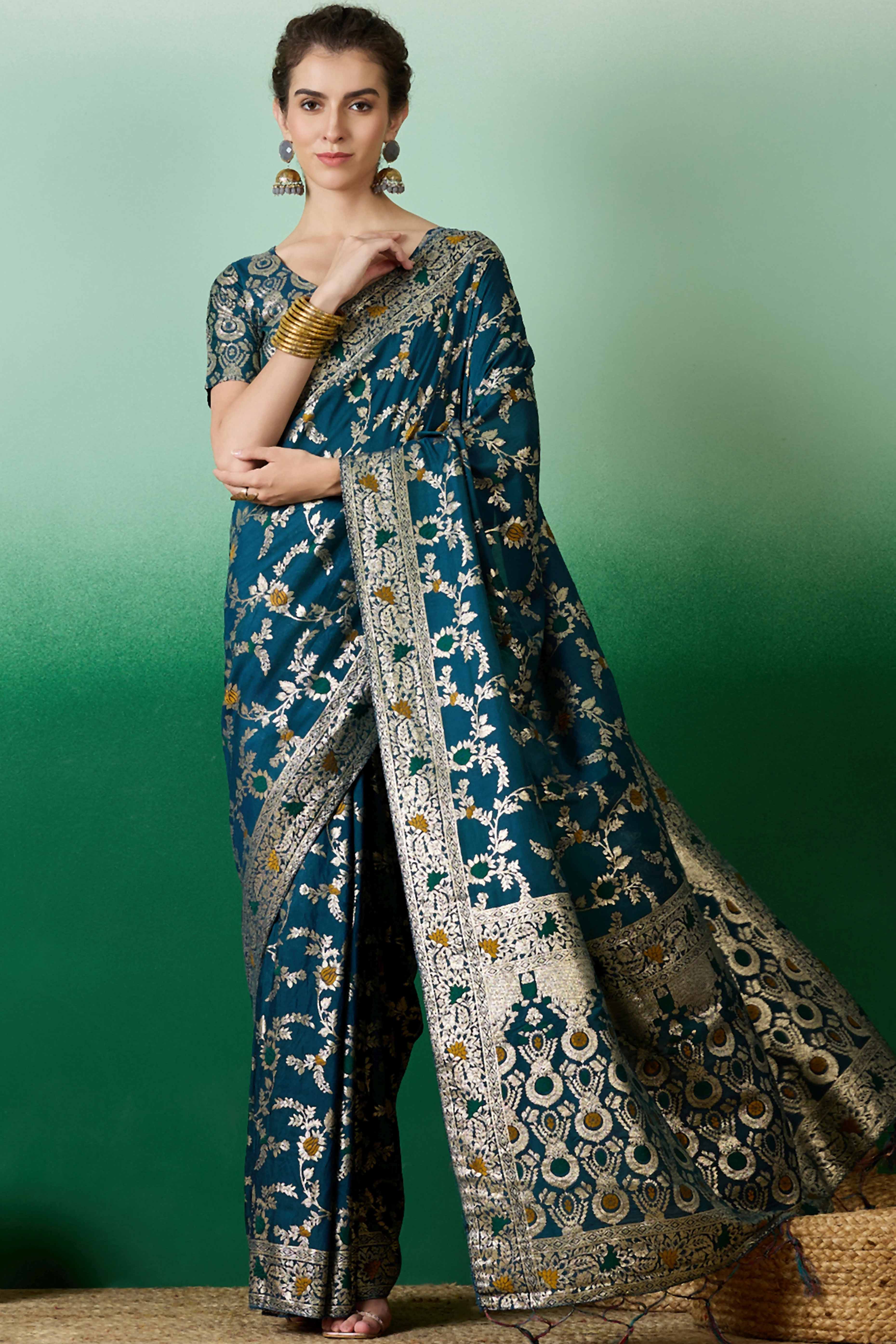 Teal Cotton Meena jacquard Saree Featuring Intricate Floral Weaving & Tassels On The Pallu