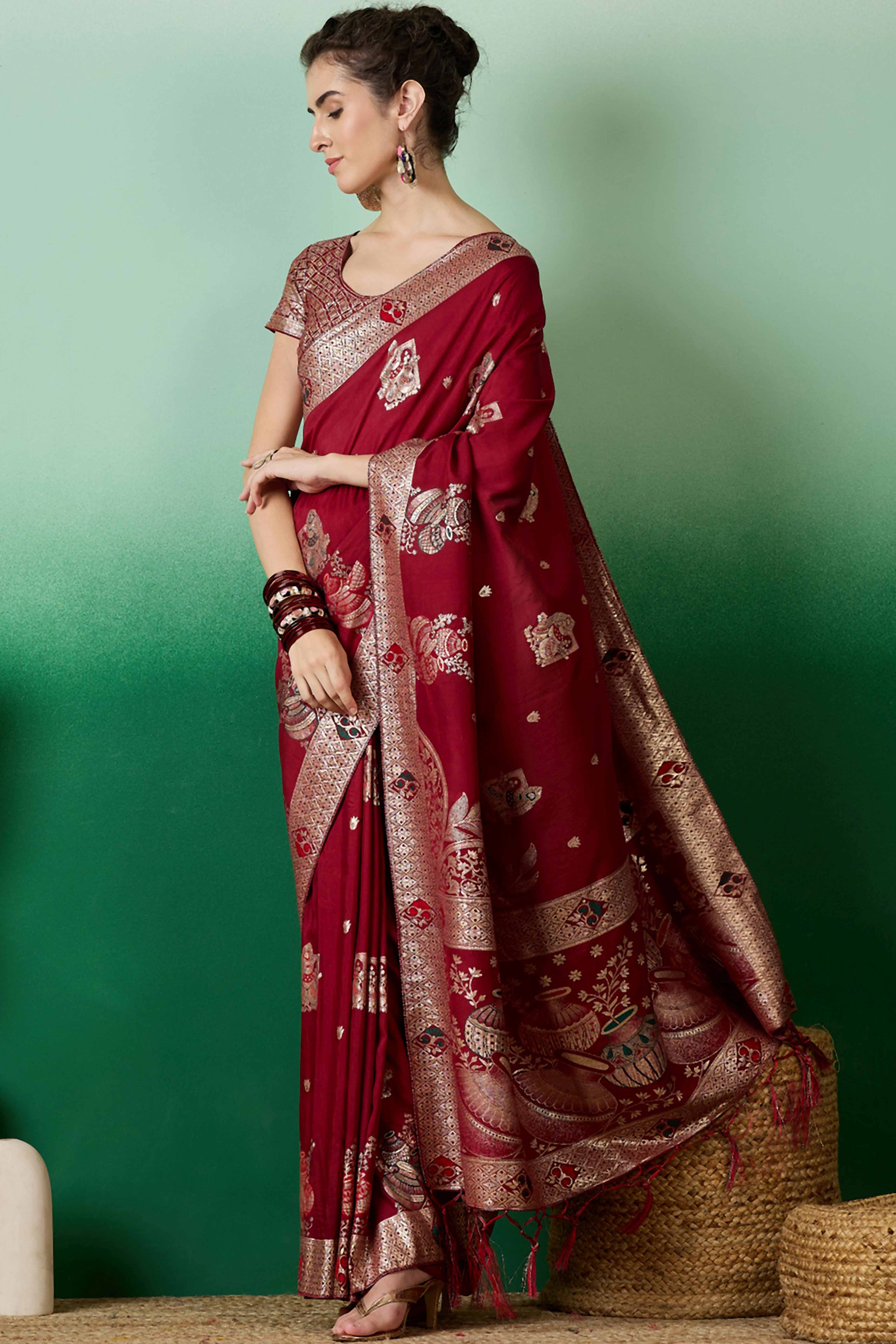 Maroon Cotton Blend Saree Adorned With Floral Zari Weaving & Soft Tassel Accents