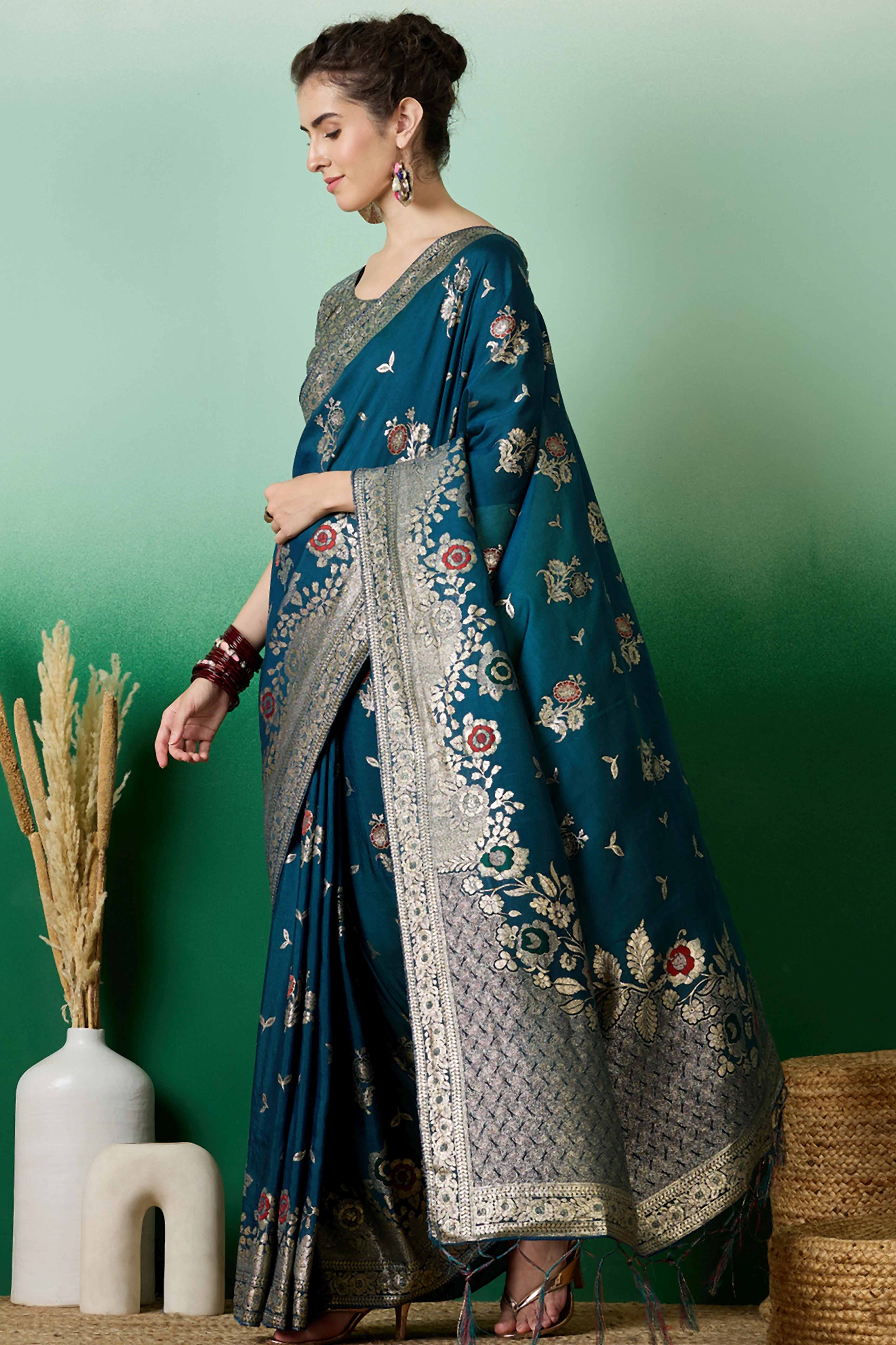 Teal Cotton Blend Saree Embellished With Floral Zari Weaving & Tasselled Pallu