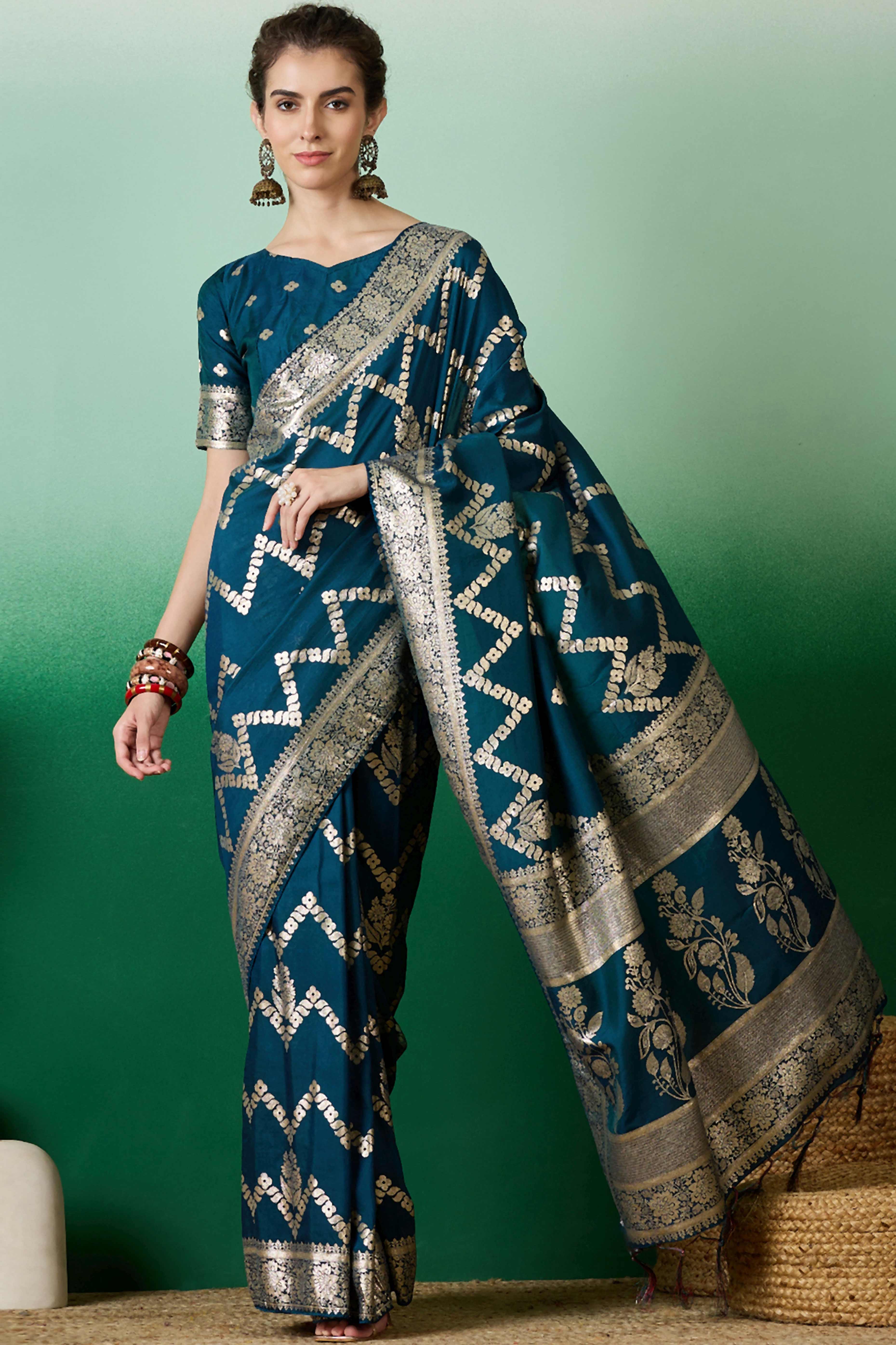 Rich Teal Blue Cotton Blend Jacquard Saree Adorned With Floral Weaving & Graceful Tassel Pallu