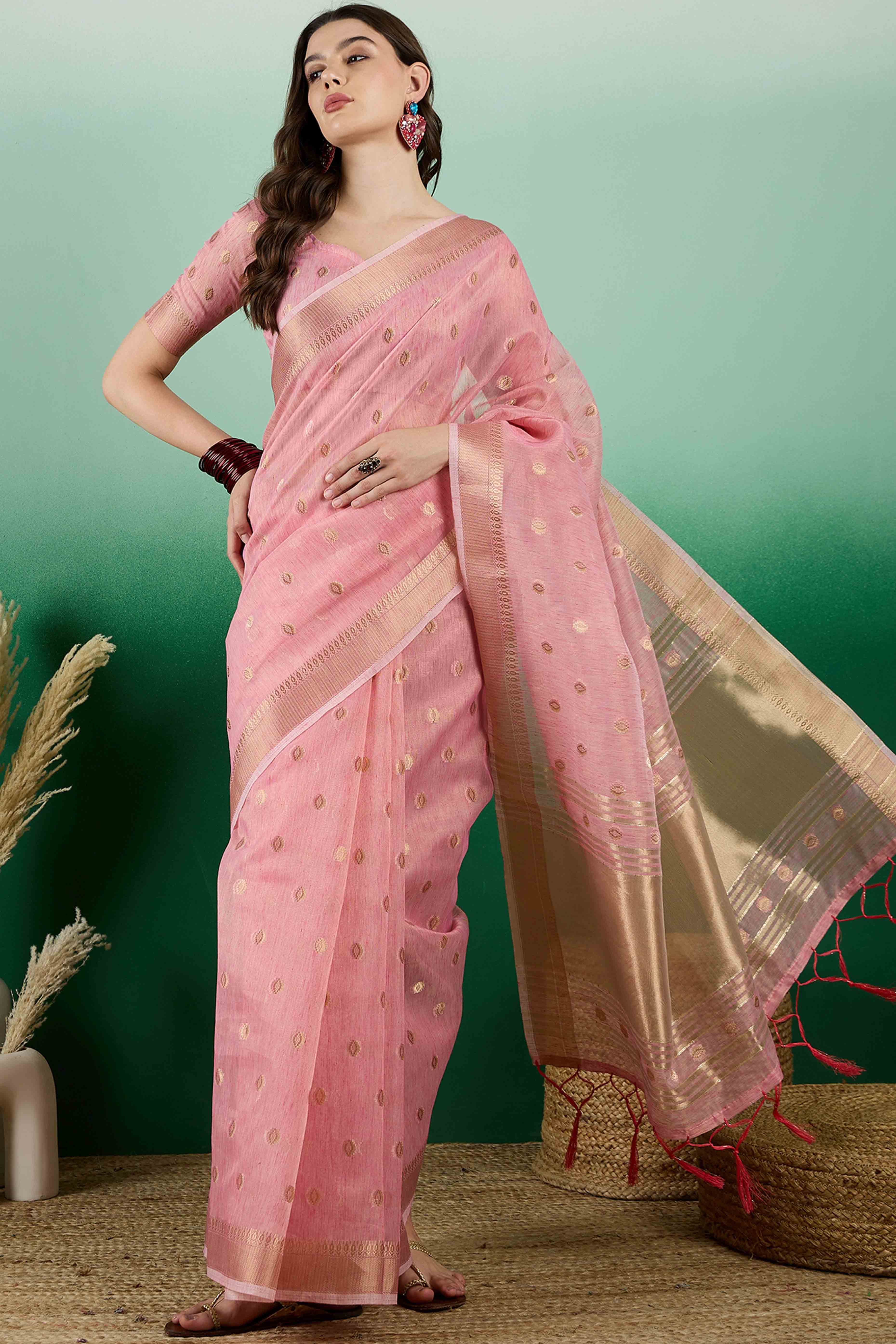 Pink Khadi Organza Saree Embellished With Traditional Zari Work & Tassels