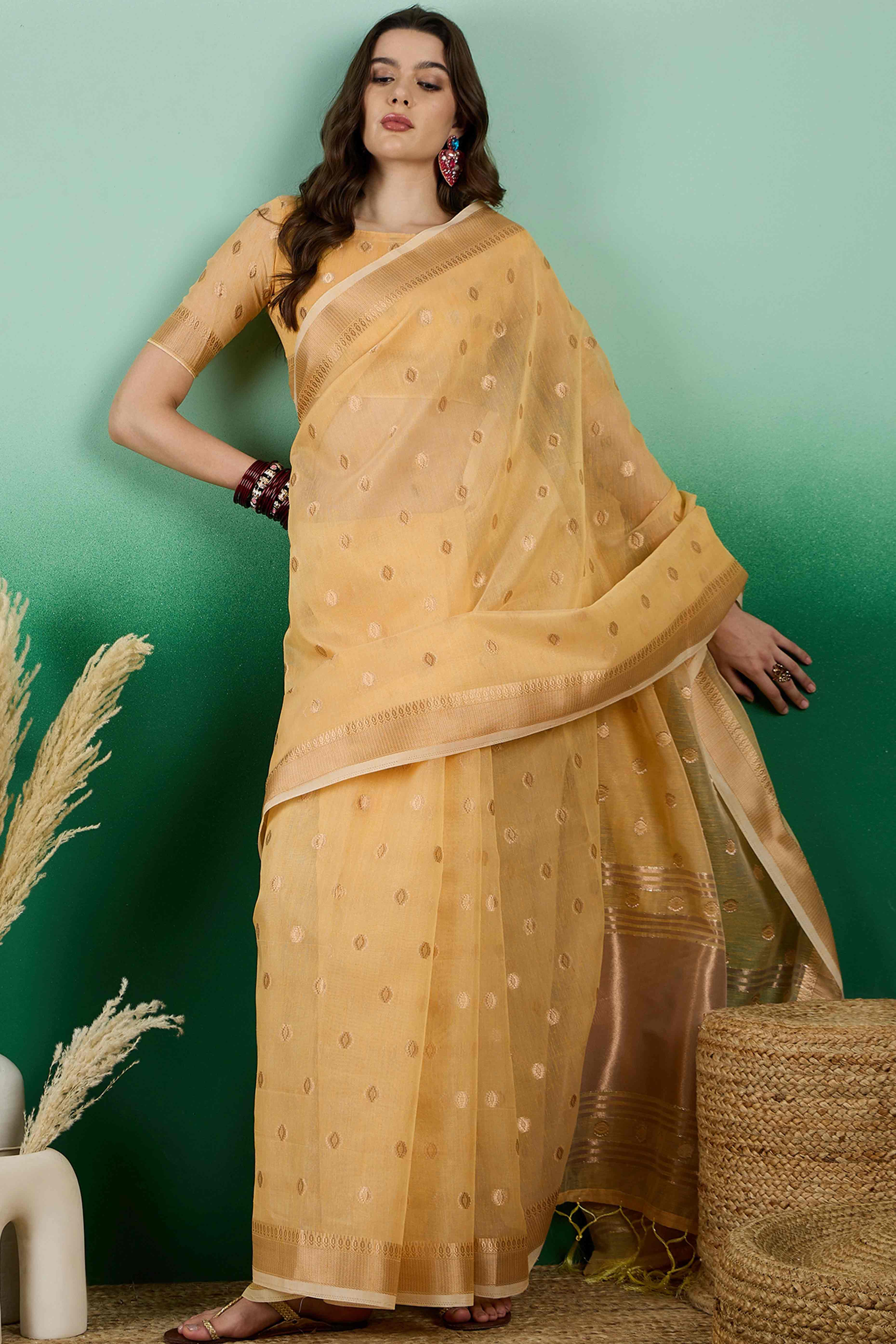 Yellow Khadi Organza Saree Embellished With Traditional Zari Work & Tassels