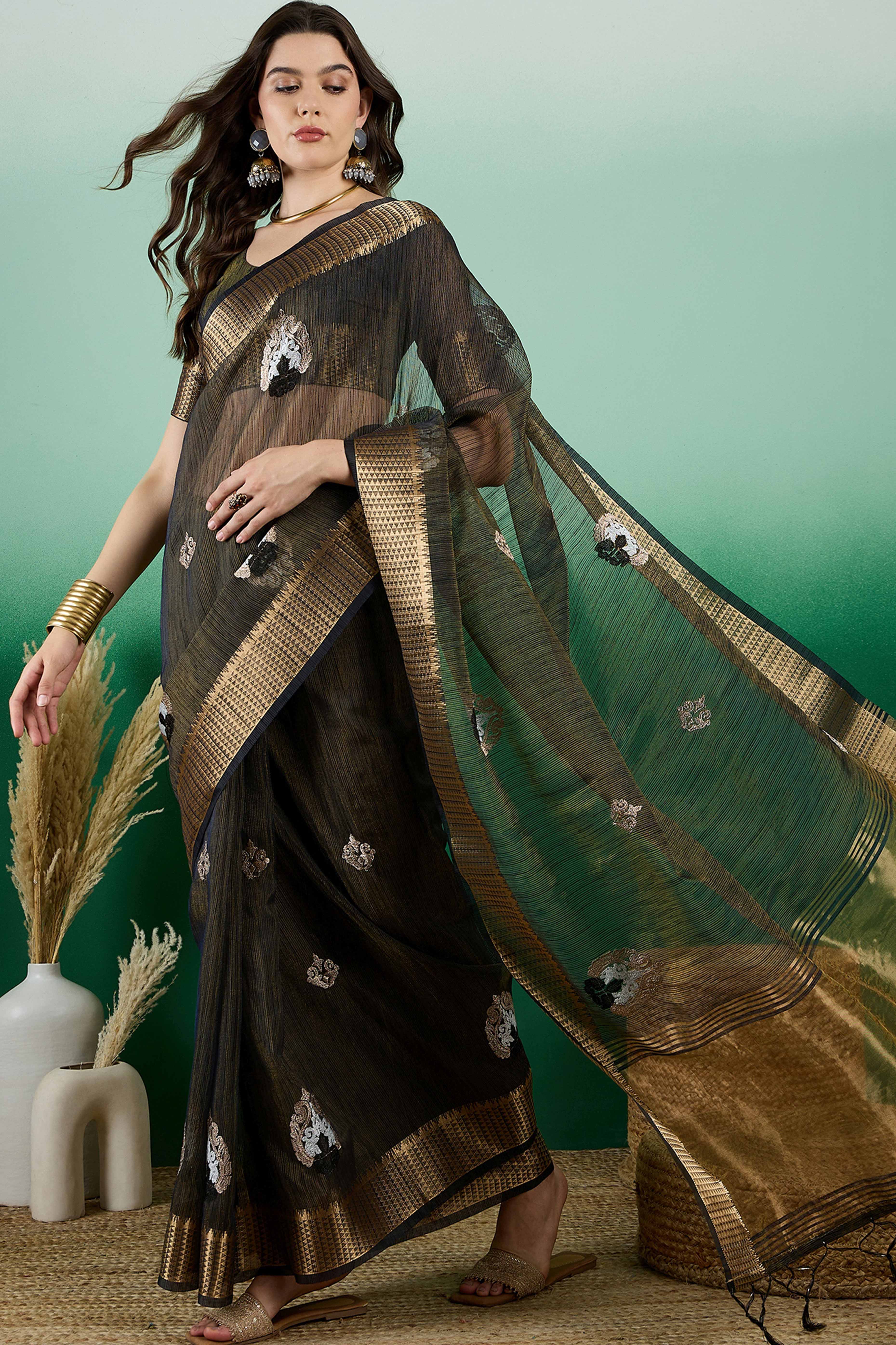 Black Khadi Organza Saree Adorned With Elegant Embroidery & Tassel Pallu
