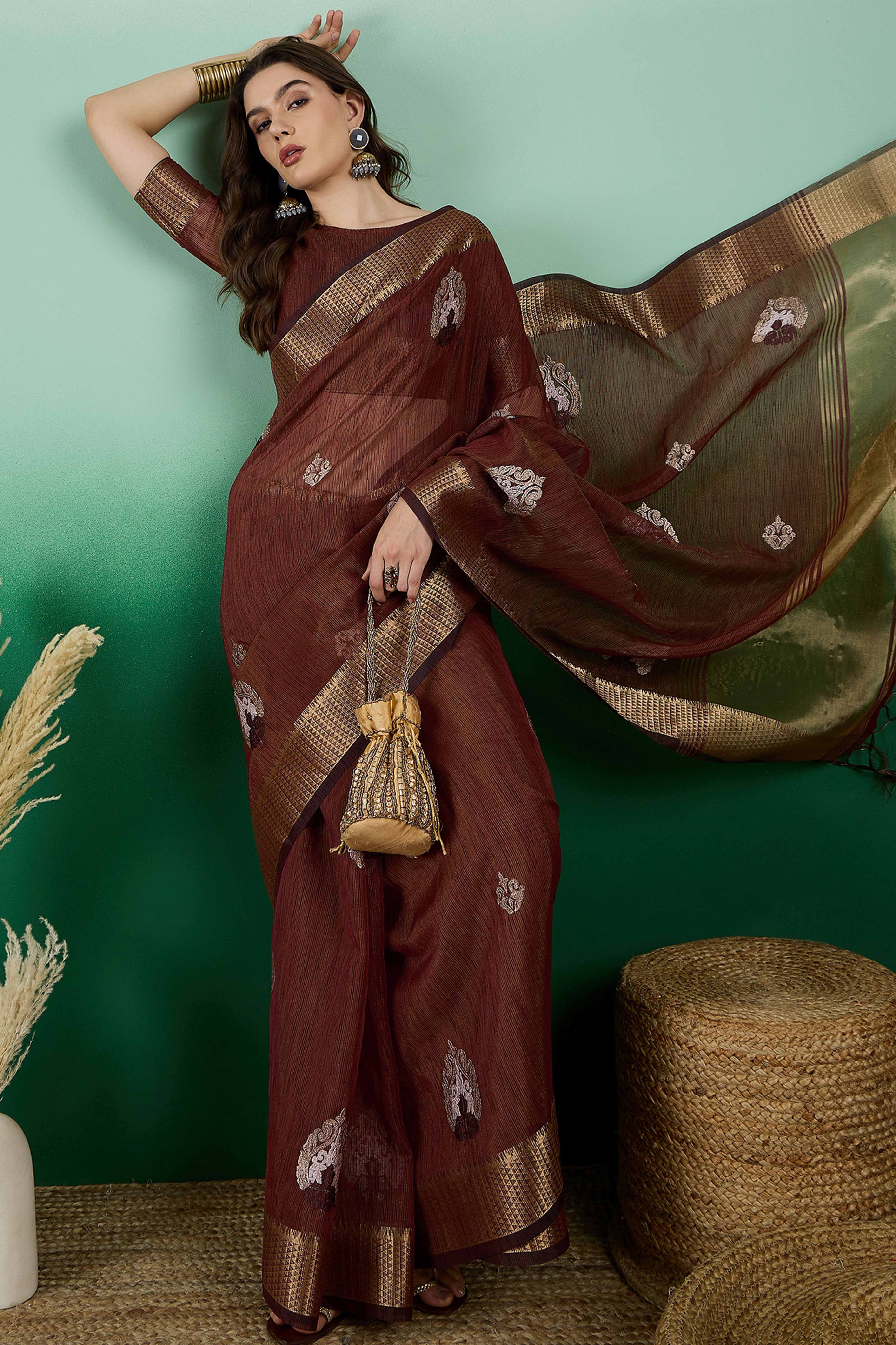 Brown Khadi Organza Saree Adorned With Elegant Embroidery & Tassel Pallu
